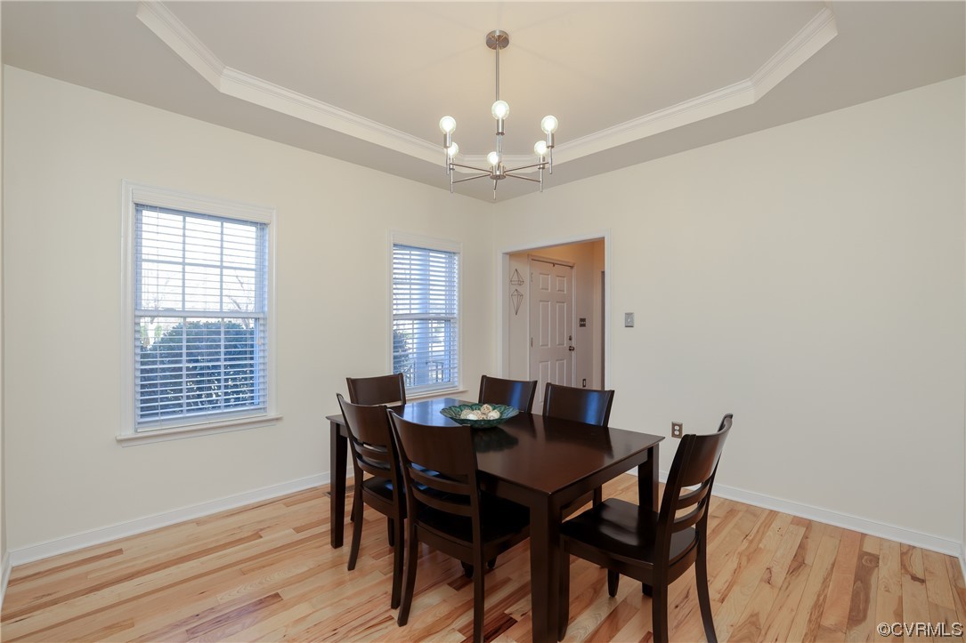 1600 Winterfield Place Midlothian, VA 23113 - Photo 7 of 43 a view of a dining room with furniture window and wooden floor