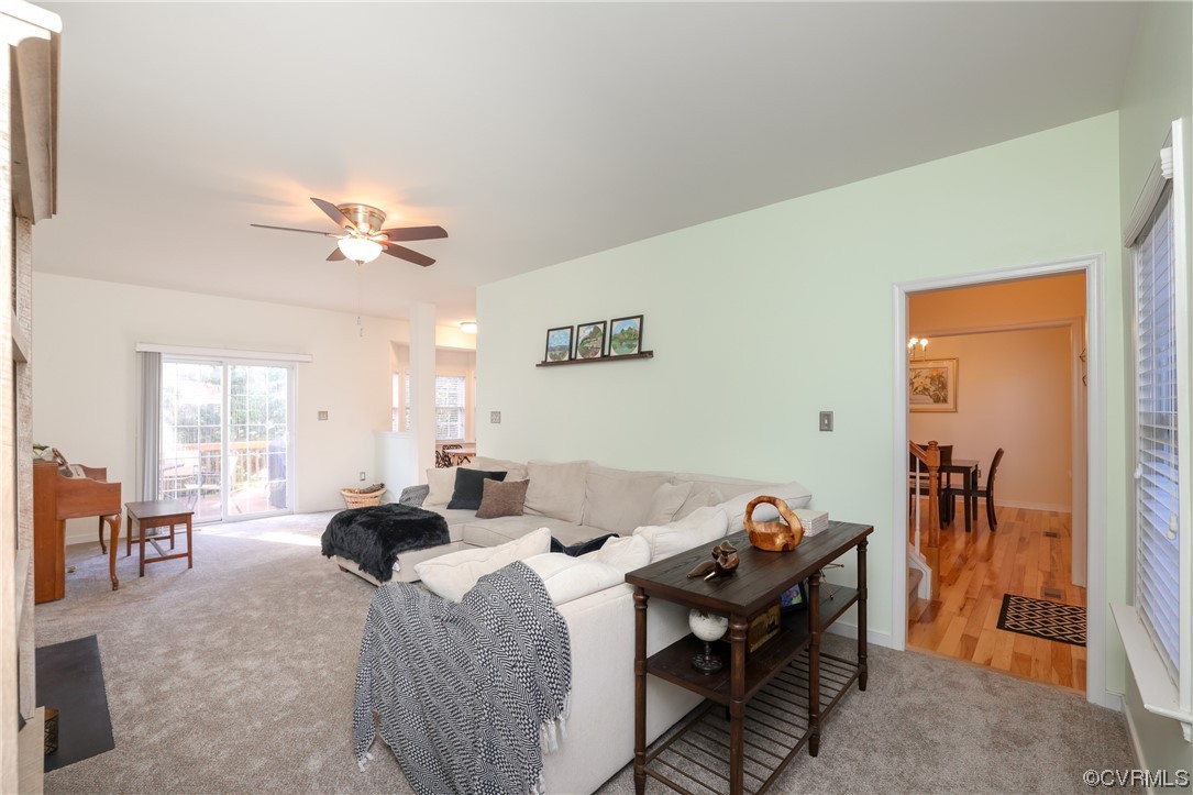 1600 Winterfield Place Midlothian, VA 23113 - Photo 9 of 43 a living room with furniture a dining table and a piano table