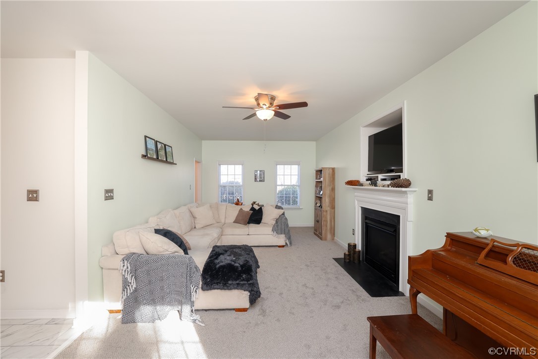 1600 Winterfield Place Midlothian, VA 23113 - Photo 10 of 43 a living room with furniture fireplace and flat screen tv