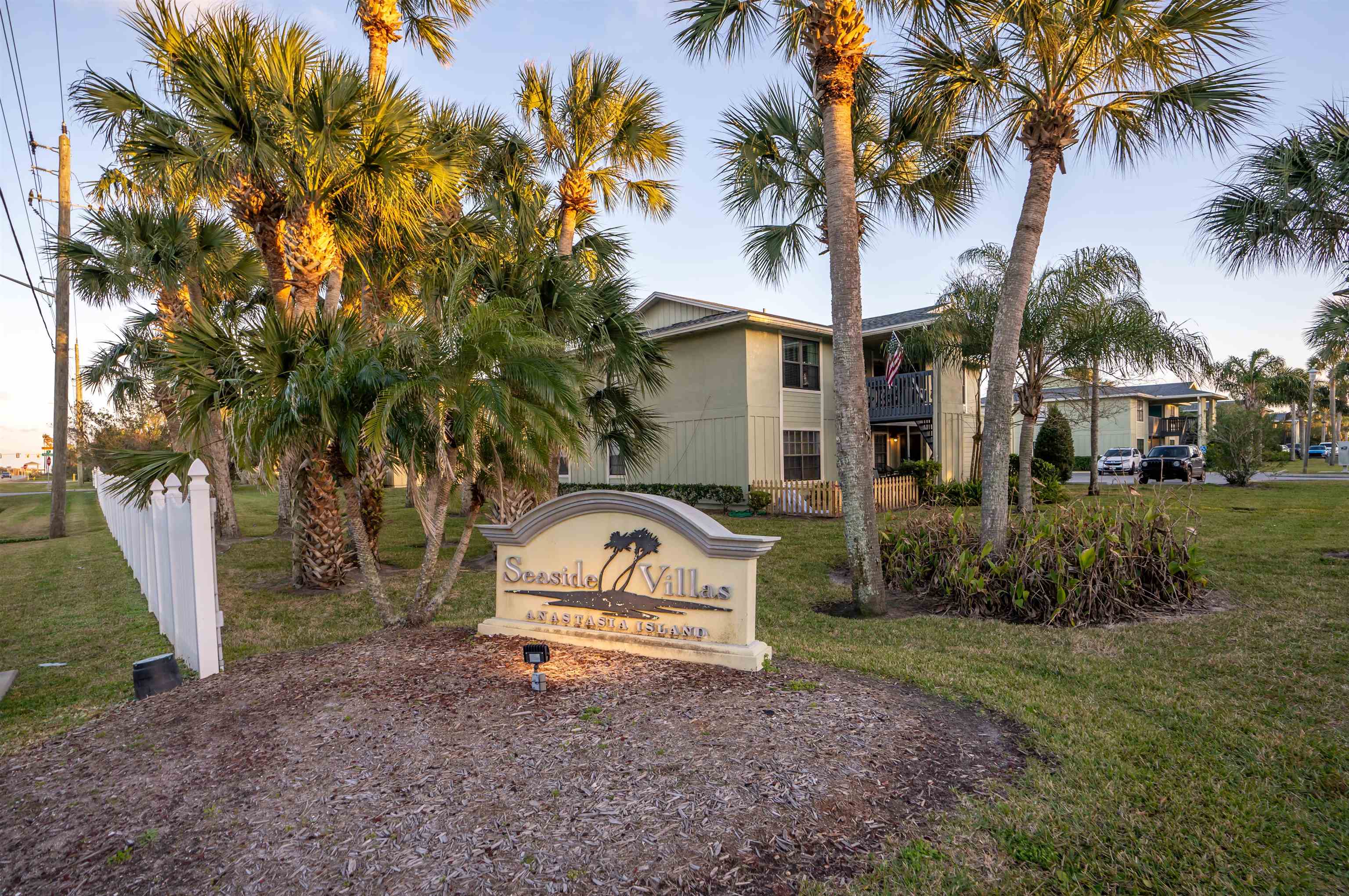 10 Brigantine Court St. Augustine, FL 32080 - Photo 23 of 26 a front view of a house with a yard and garage