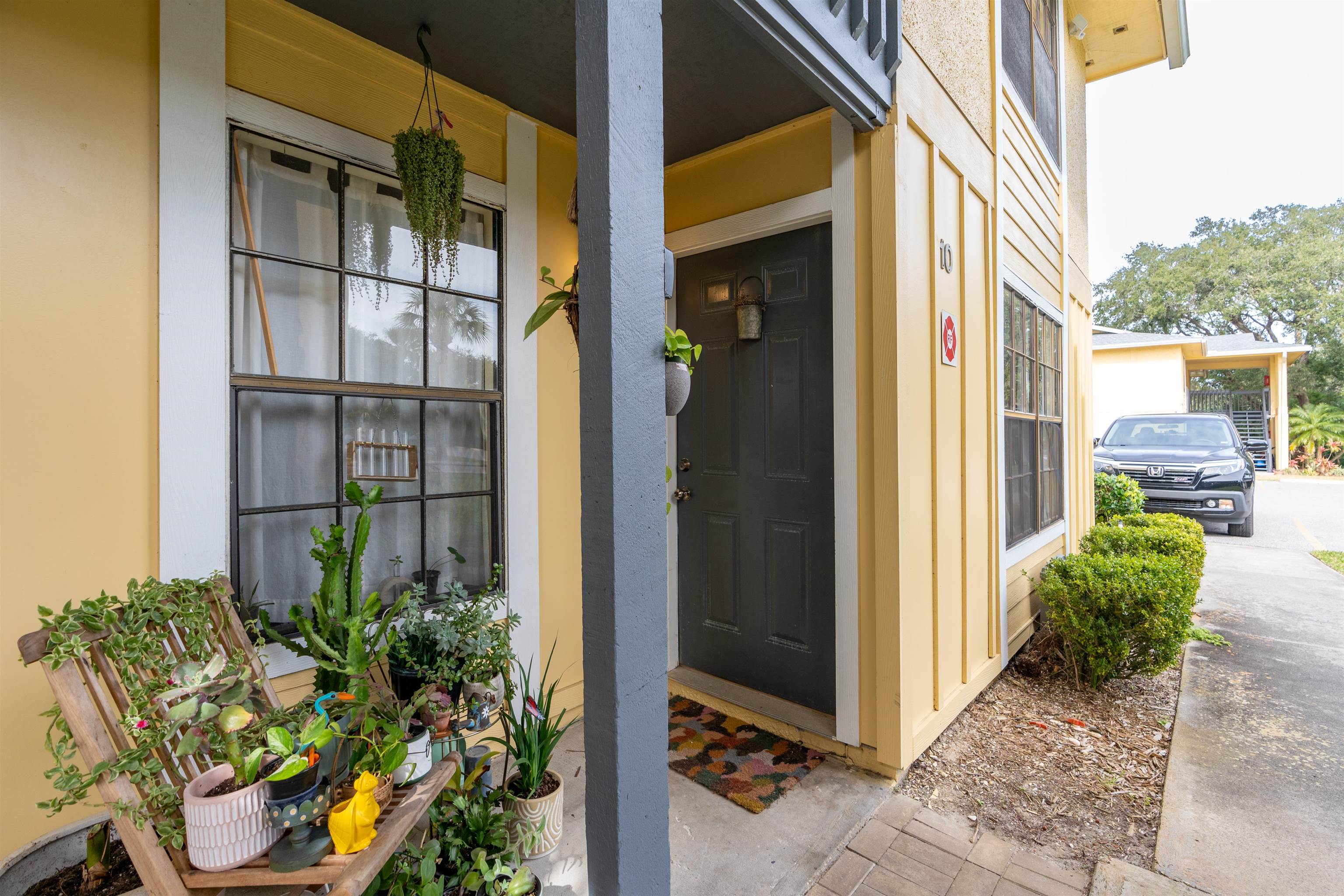 10 Brigantine Court St. Augustine, FL 32080 - Photo 3 of 26 a view of a door and chair in the balcony