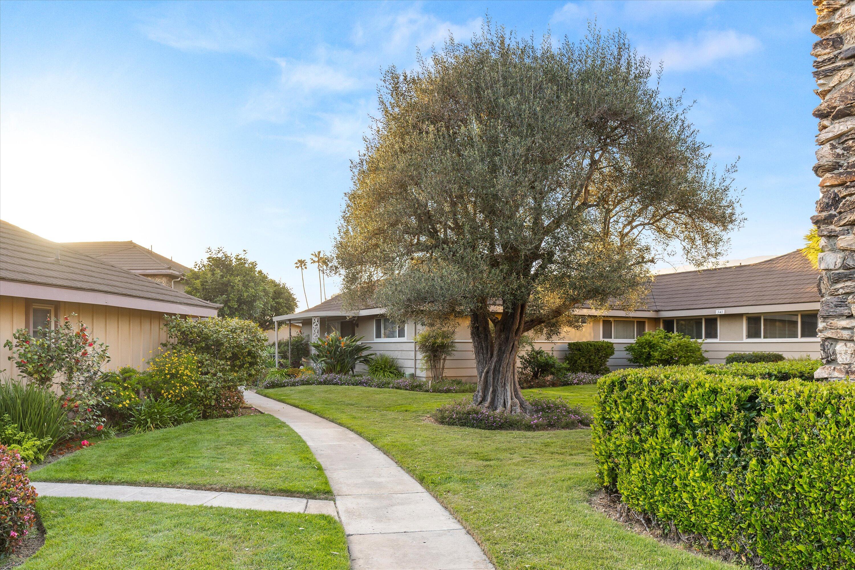 5722 Encina Road, Unit 4 Goleta, CA 93117 - Photo 25 of 28 a front view of a house with a yard