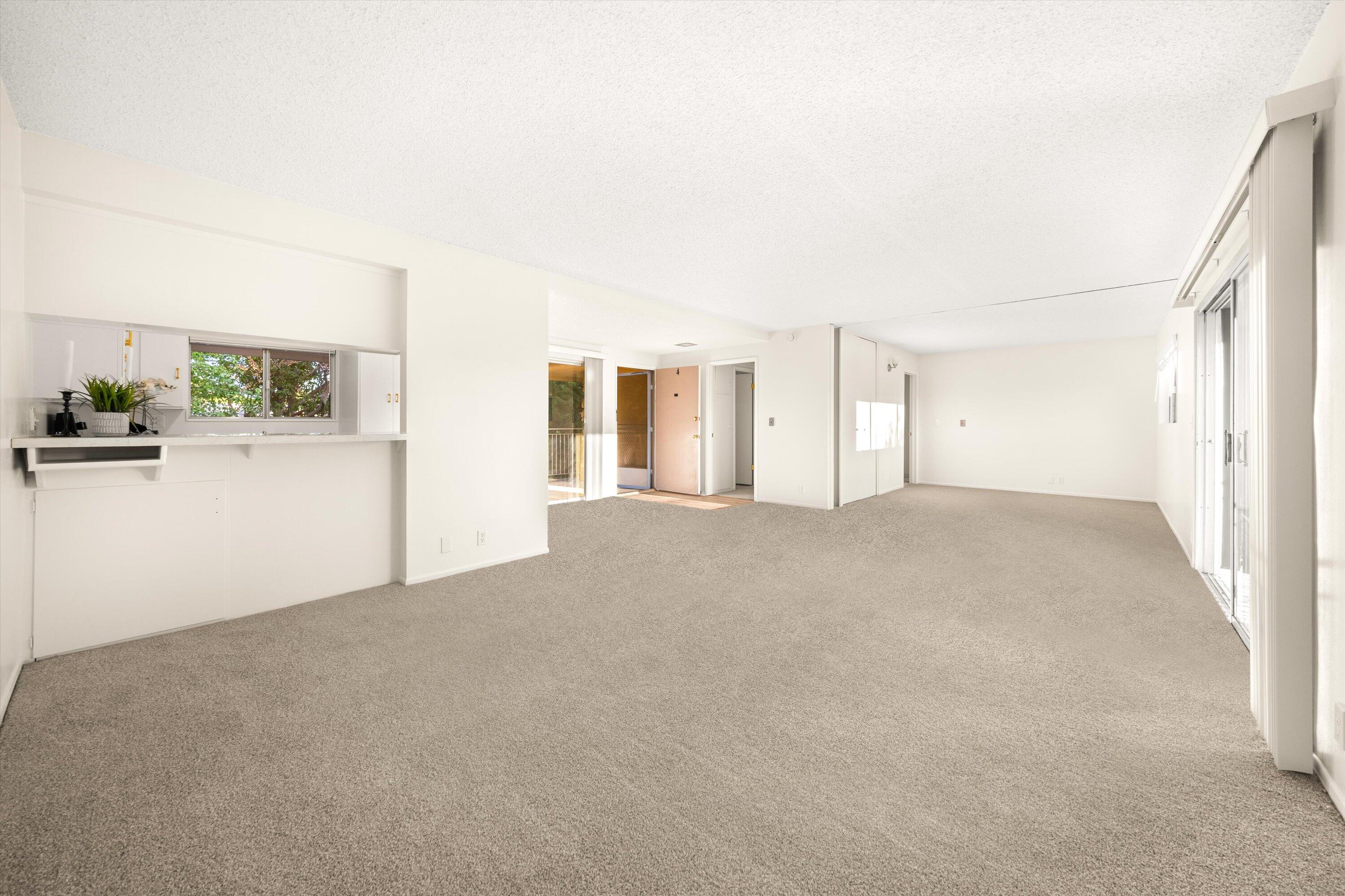 5722 Encina Road, Unit 4 Goleta, CA 93117 - Photo 4 of 28 a view of an empty room with a window
