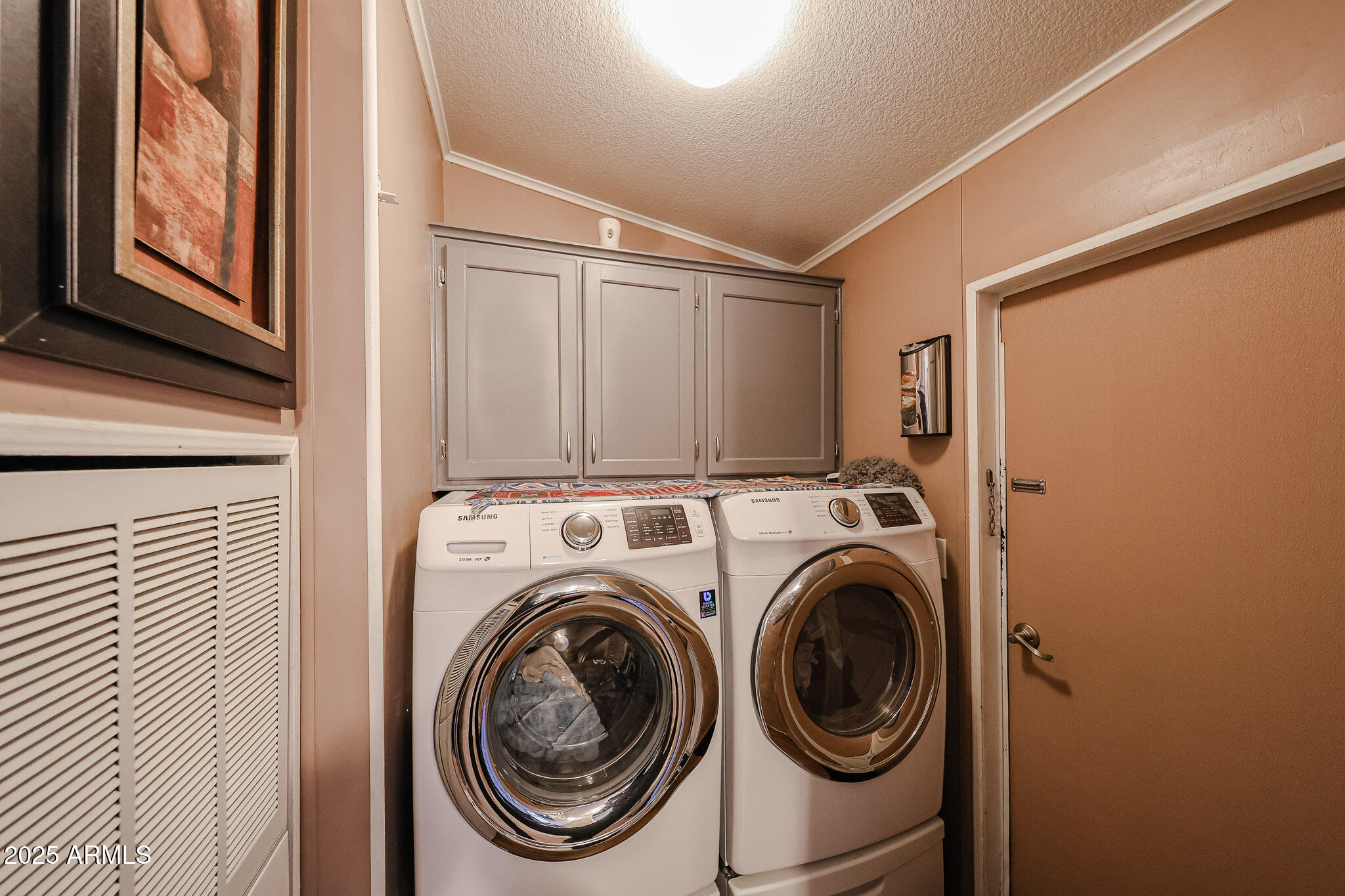 19602 North 32nd Street, Unit 32 Phoenix, AZ 85050 - Photo 22 of 37 a utility room with dryer and washer