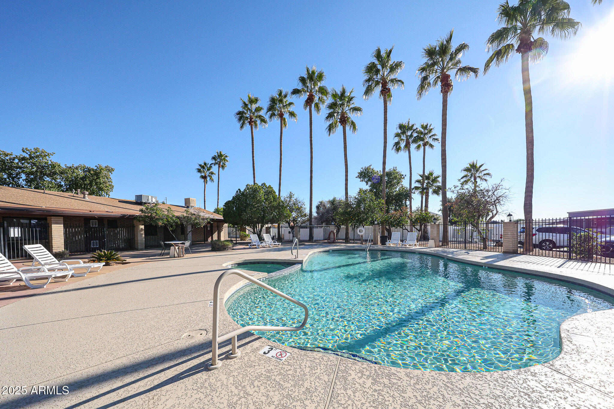 19602 North 32nd Street, Unit 32 Phoenix, AZ 85050 - Photo 37 of 37 a view of a swimming pool with a patio