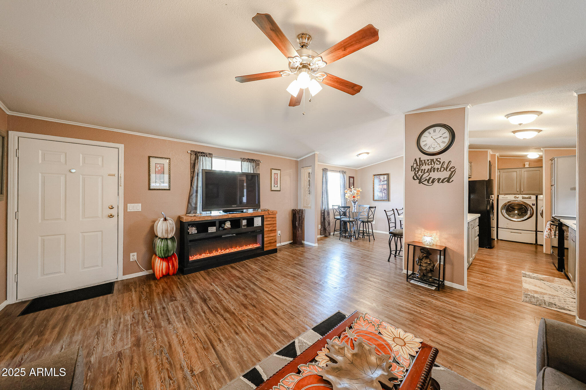 19602 North 32nd Street, Unit 32 Phoenix, AZ 85050 - Photo 9 of 37 a living room with furniture and a wooden floor