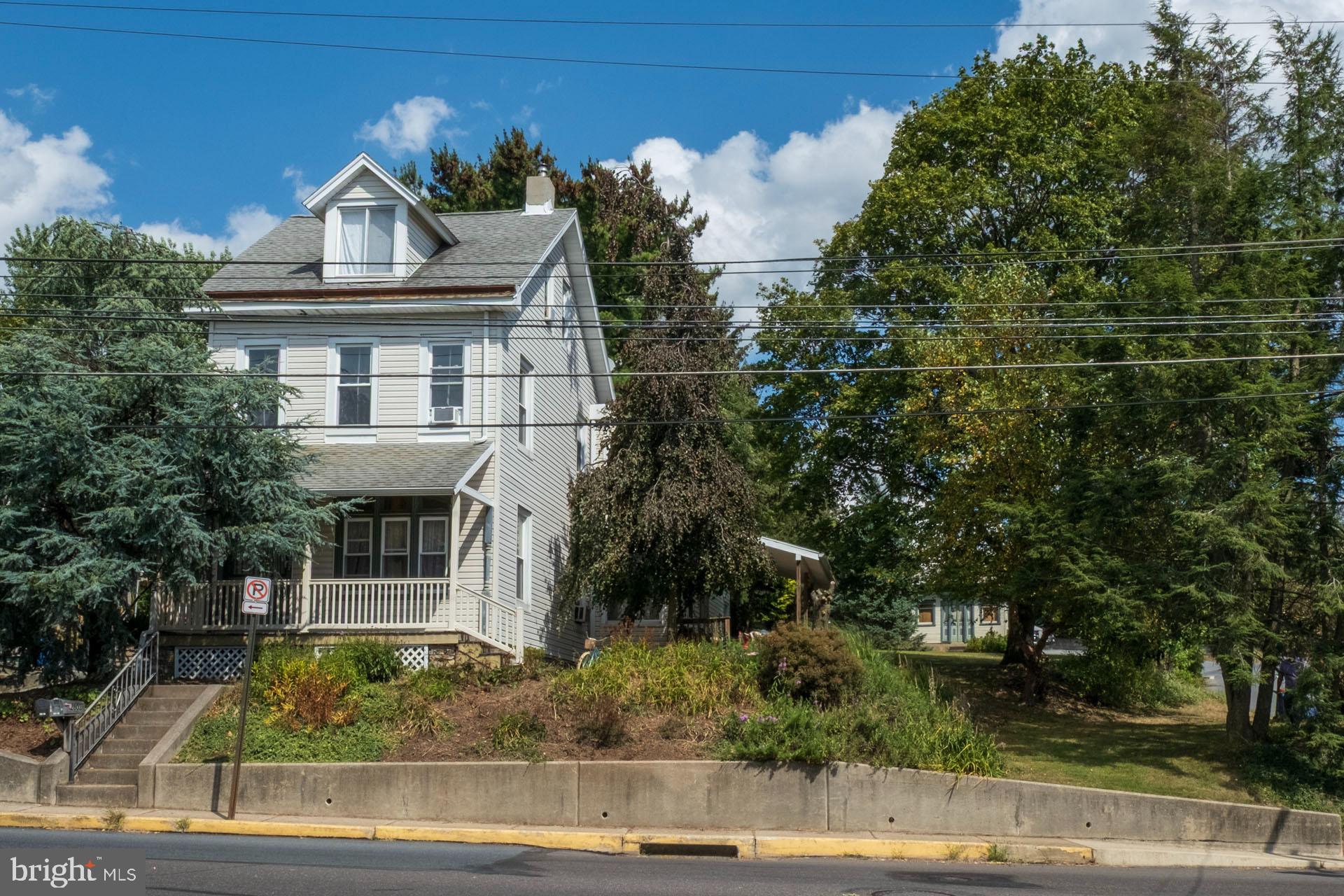 2803 Kutztown Road Reading, PA 19605 - Photo 1 of 33 a front view of a house with garden