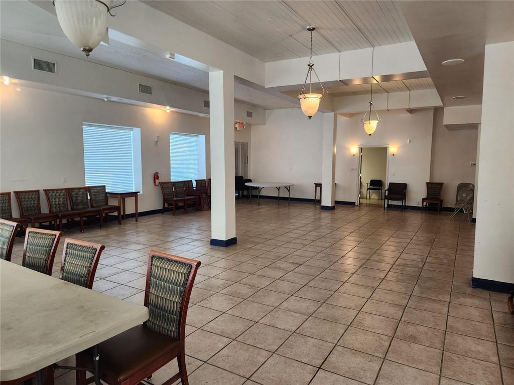 6958 Main Street Lithonia, GA 30058 - Photo 12 of 55 a view of a dining area with furniture
