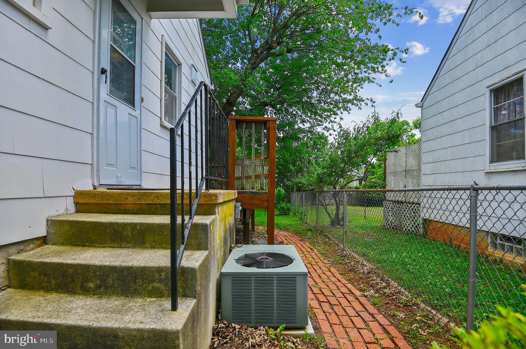 3613 Kenmar Road Baltimore, MD 21244 - Photo 18 of 64 Back entrance -brick path to yard and deck