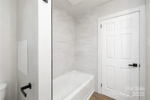 a bathroom with a bathtub