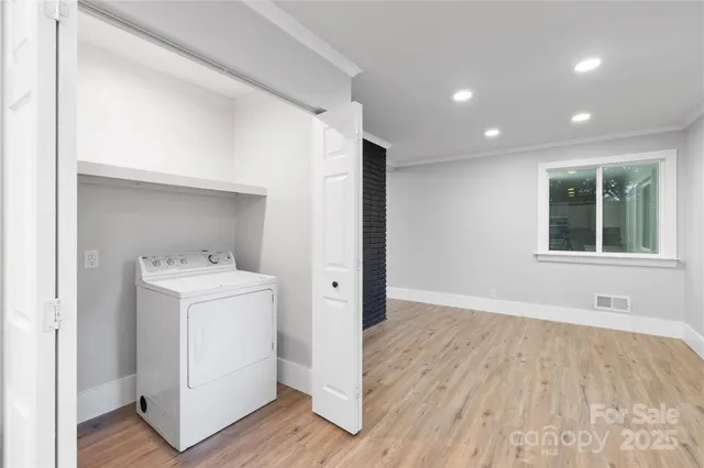 a view of utility room with washer and dryer