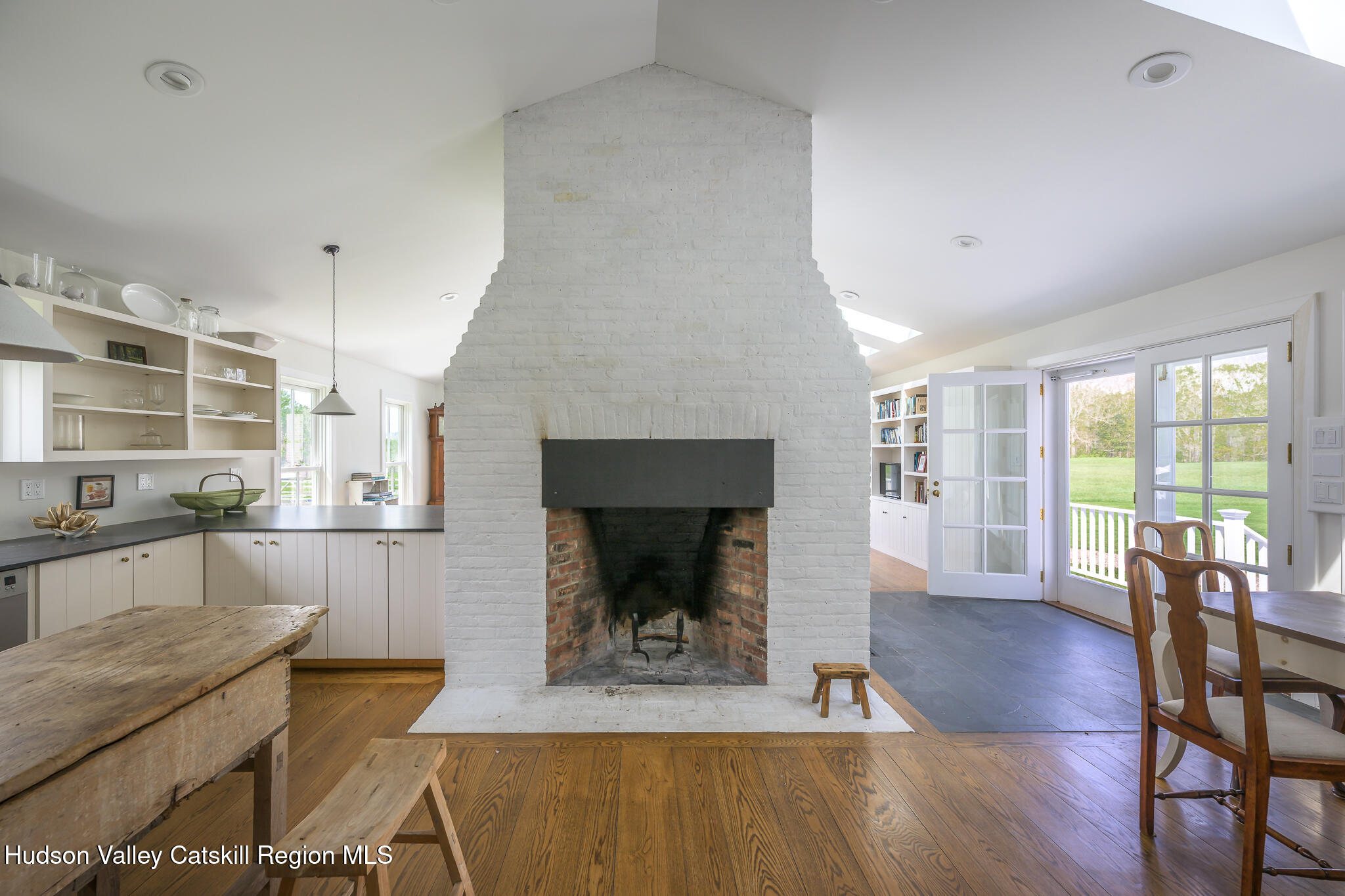 159 Riders Mills Road Old Chatham, NY 12136 - Photo 14 of 42 a living room with furniture and a fireplace