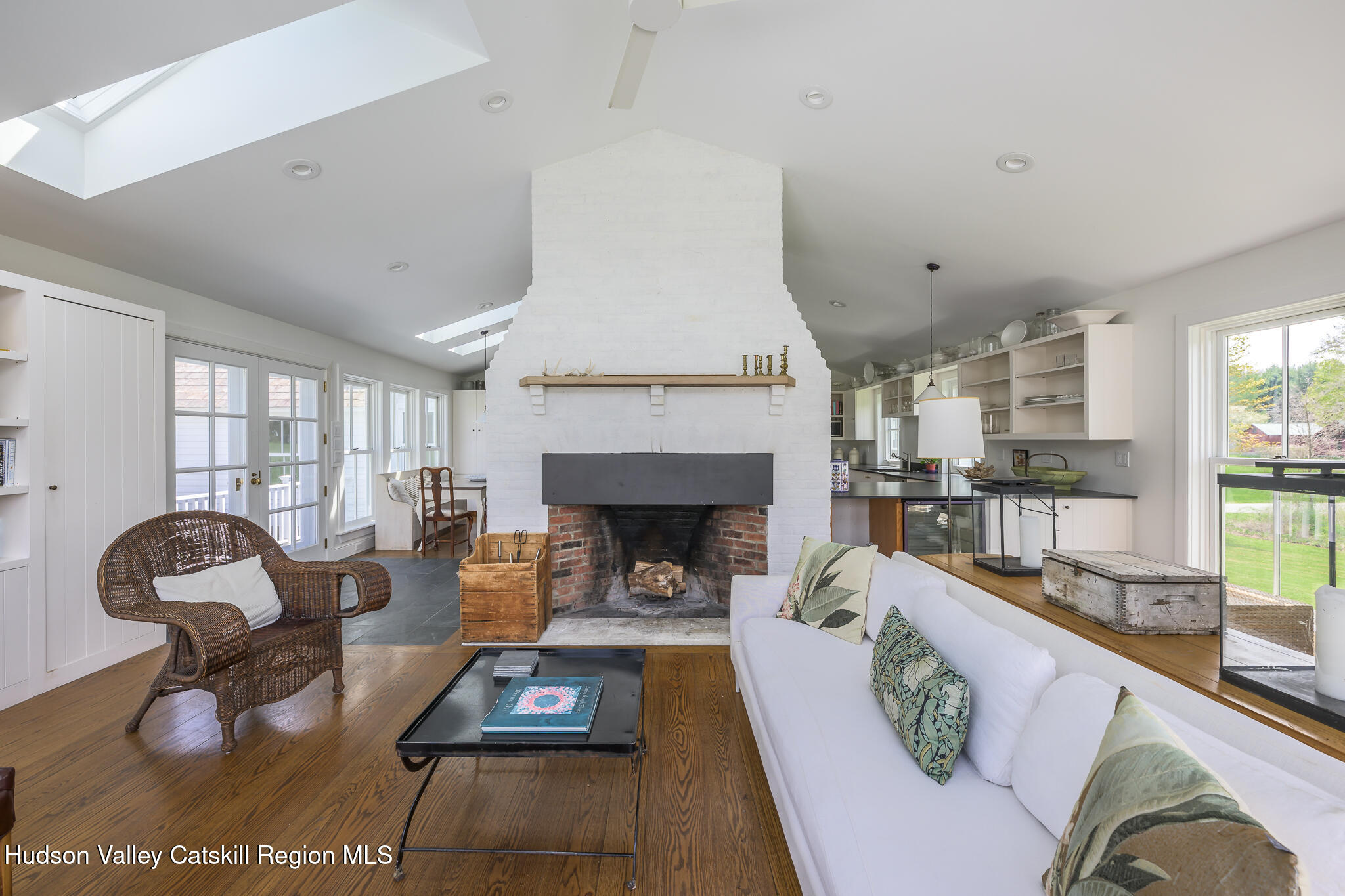 159 Riders Mills Road Old Chatham, NY 12136 - Photo 15 of 42 a living room with furniture and a fireplace