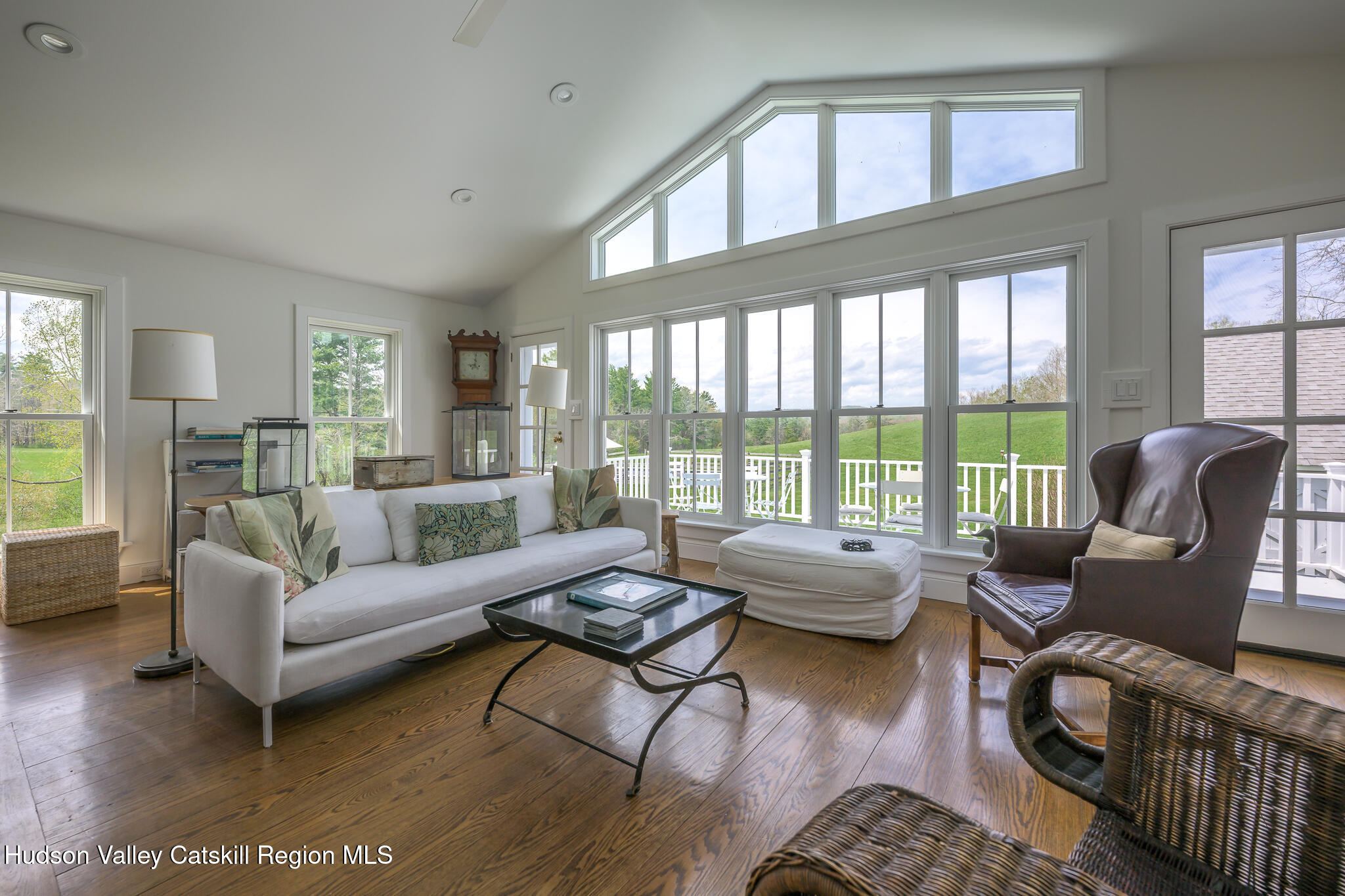 159 Riders Mills Road Old Chatham, NY 12136 - Photo 16 of 42 a living room with furniture and a large window
