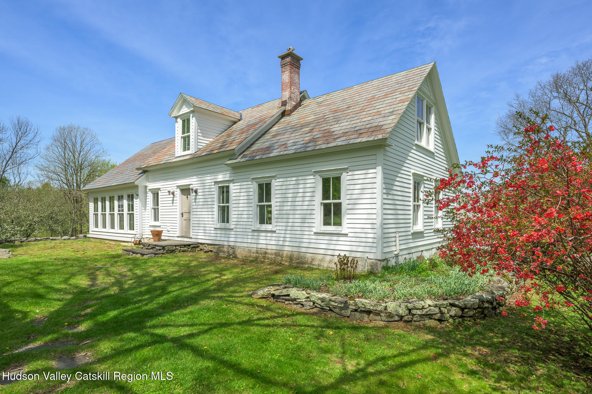 159 Riders Mills Road Old Chatham, NY 12136 - Photo 2 of 42 a backyard of a house with lots of green space