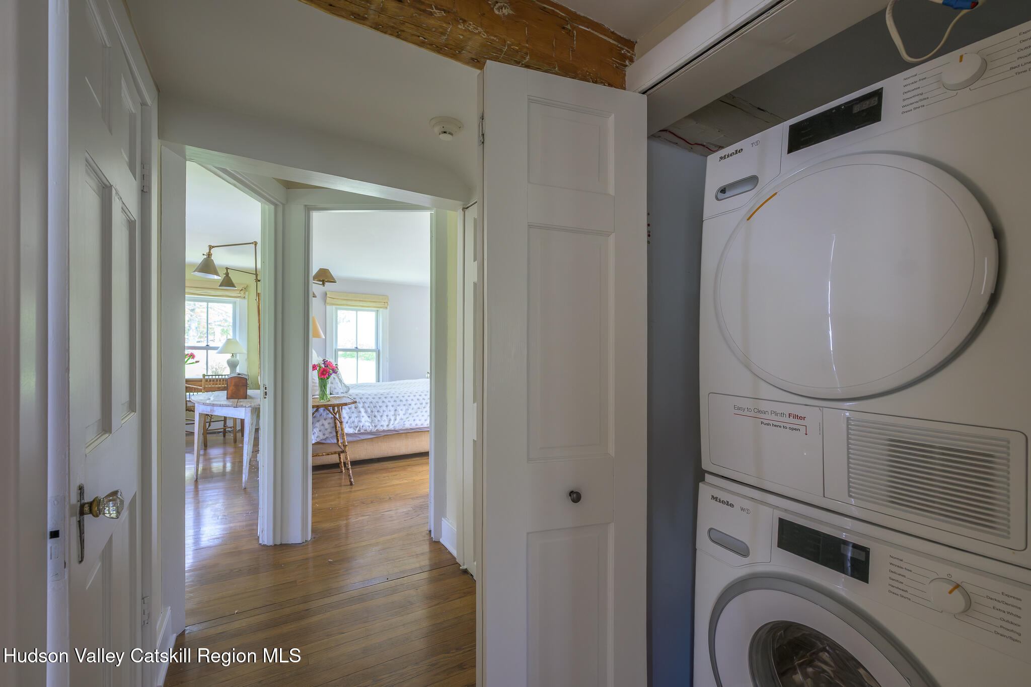 159 Riders Mills Road Old Chatham, NY 12136 - Photo 25 of 42 a view of a hallway with washer and dryer