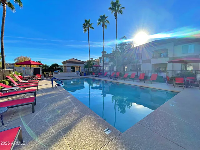 a view of a living room and kitchen