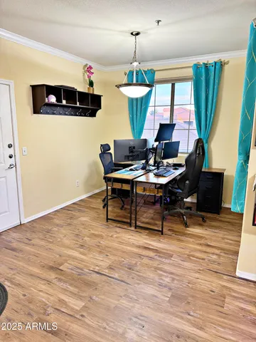 a kitchen with stainless steel appliances a stove a microwave and a refrigerator