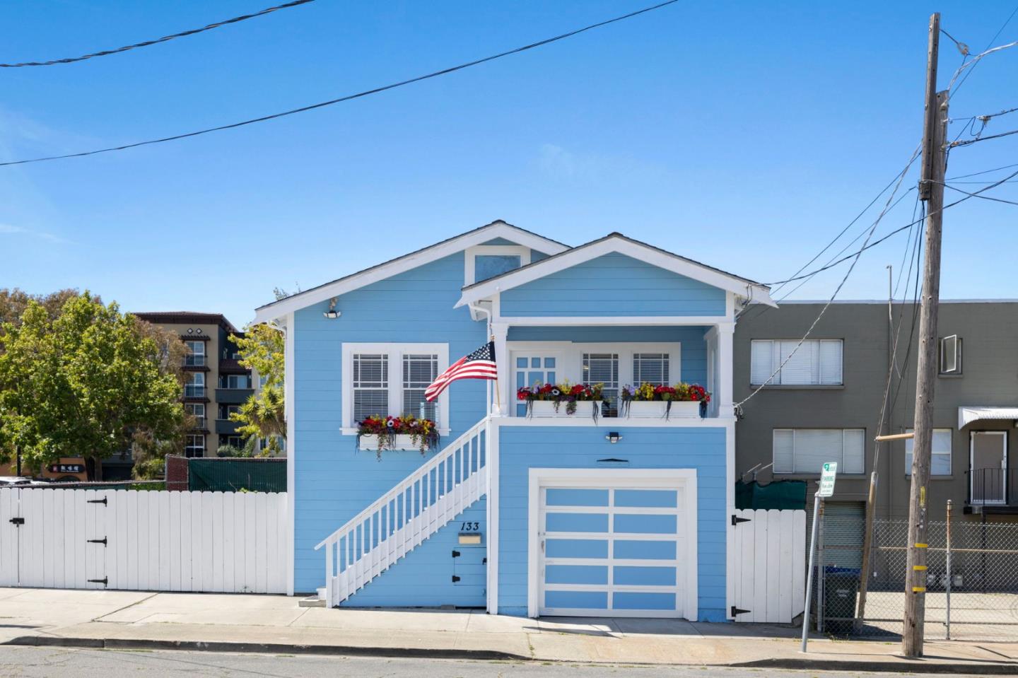 133 Serra Avenue Millbrae, CA 94030 - Photo 1 of 1 a front view of a house with large windows