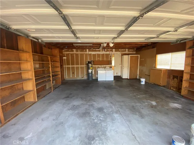 a view of a room with wooden walls