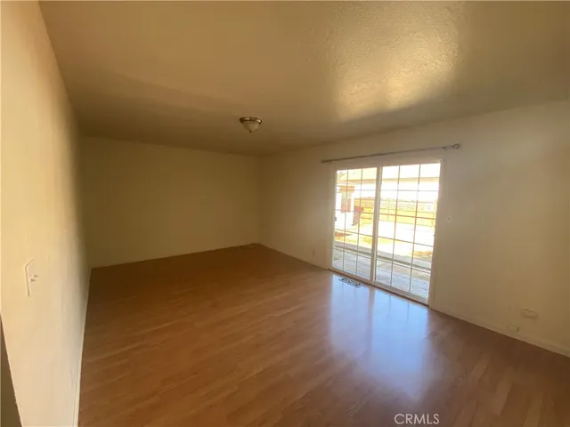 a view of a house with a snow in the yard