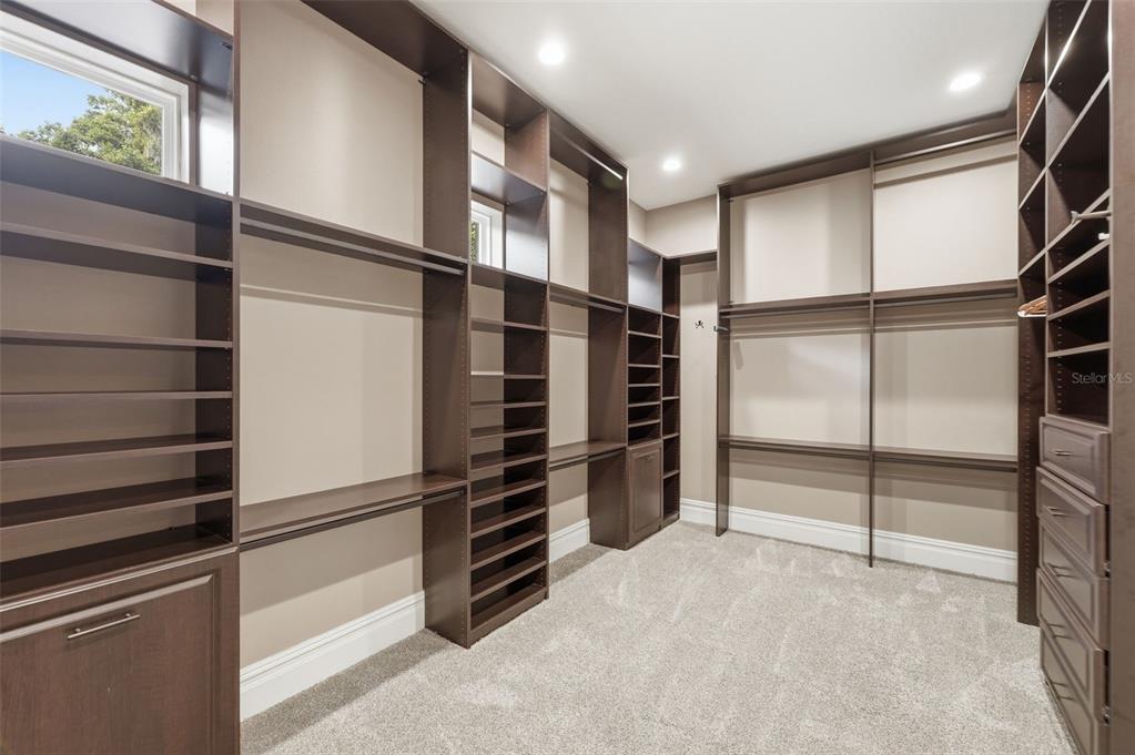 855 Southeast 87th Street Ocala, FL 34480 - Photo 49 of 79 a view of walk in closet with empty racks
