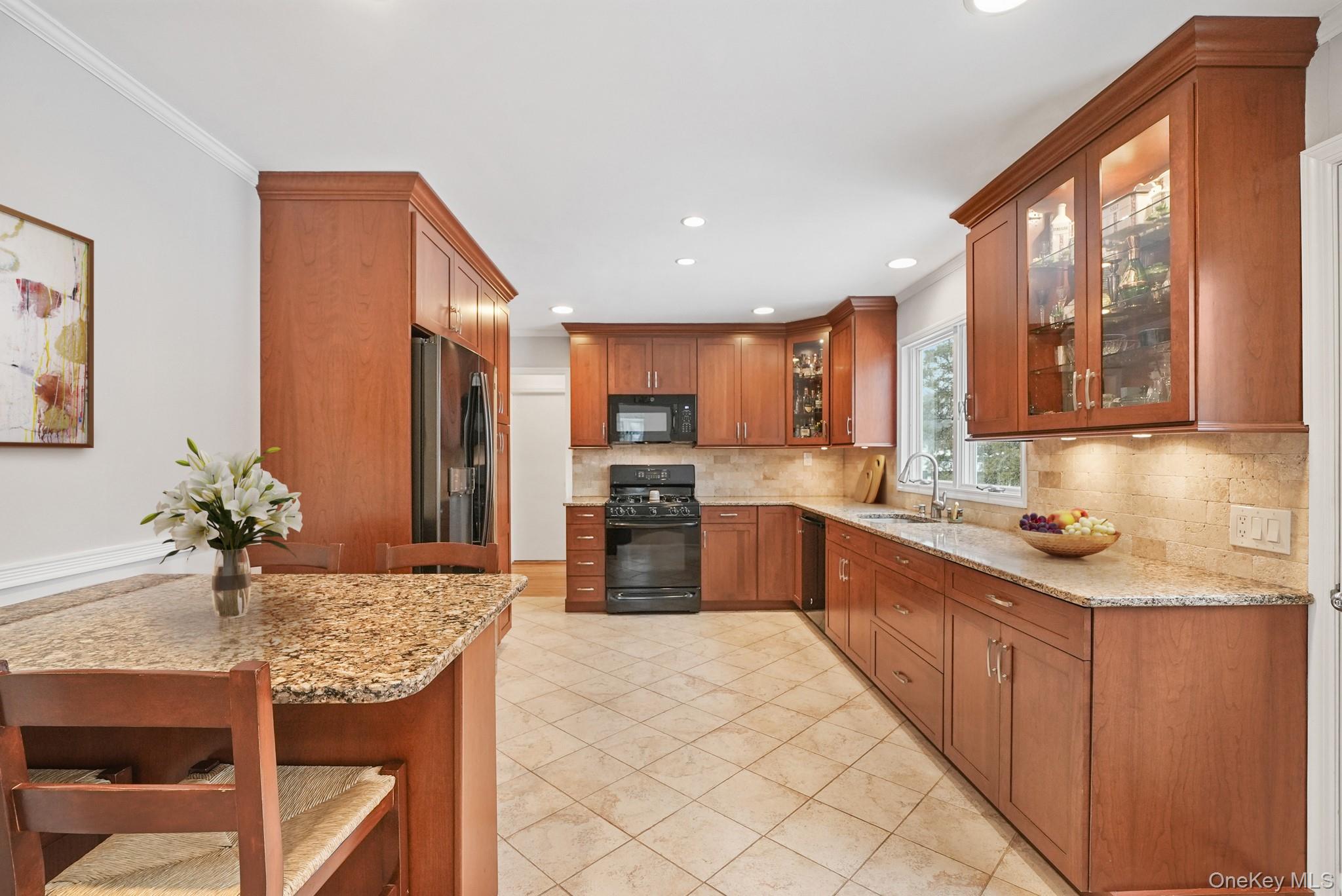 33 Overlook Road Ardsley, NY 10502 - Photo 13 of 32 a kitchen with kitchen island granite countertop a sink and counter space