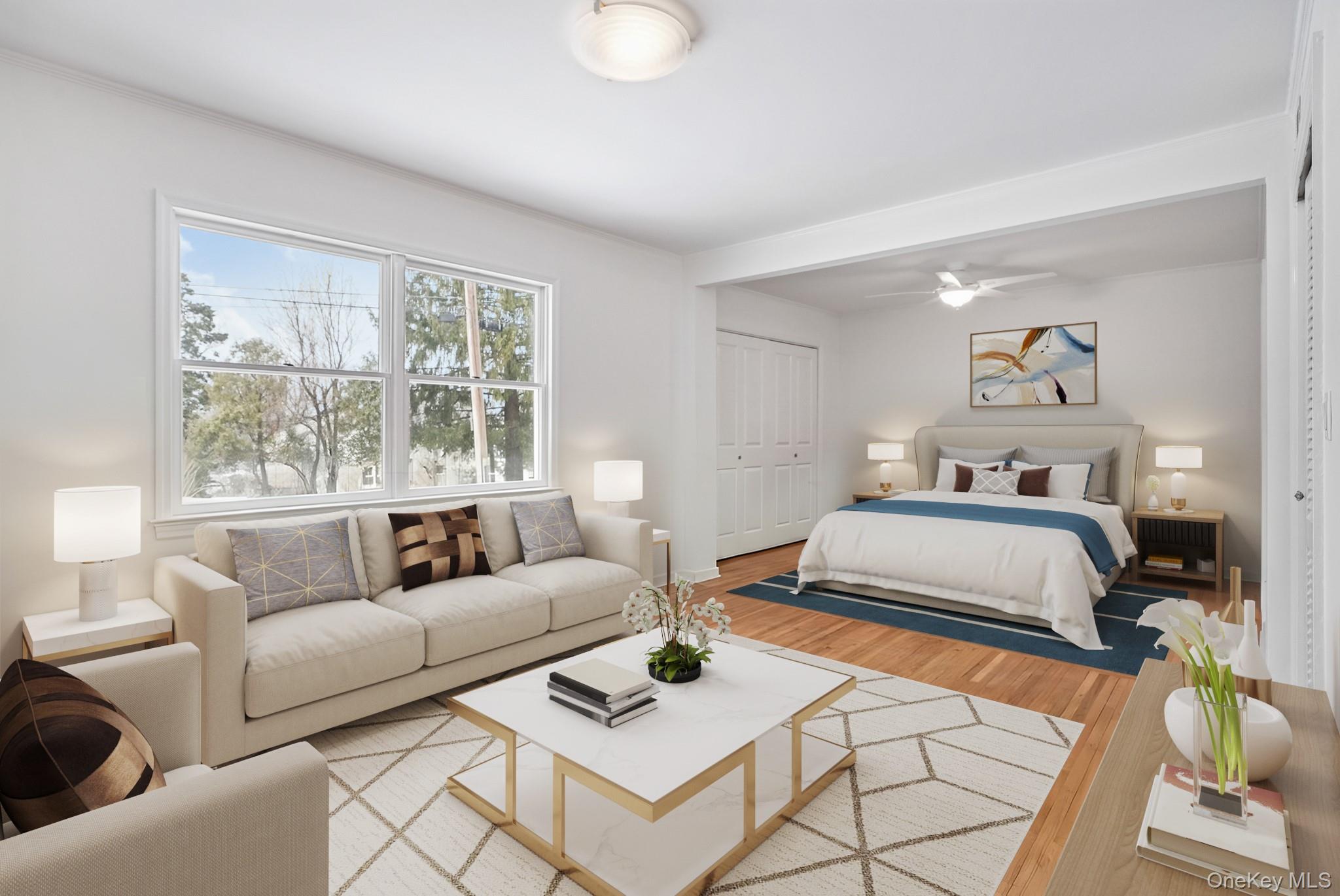 33 Overlook Road Ardsley, NY 10502 - Photo 18 of 32 a bedroom with a bed a couch and a window