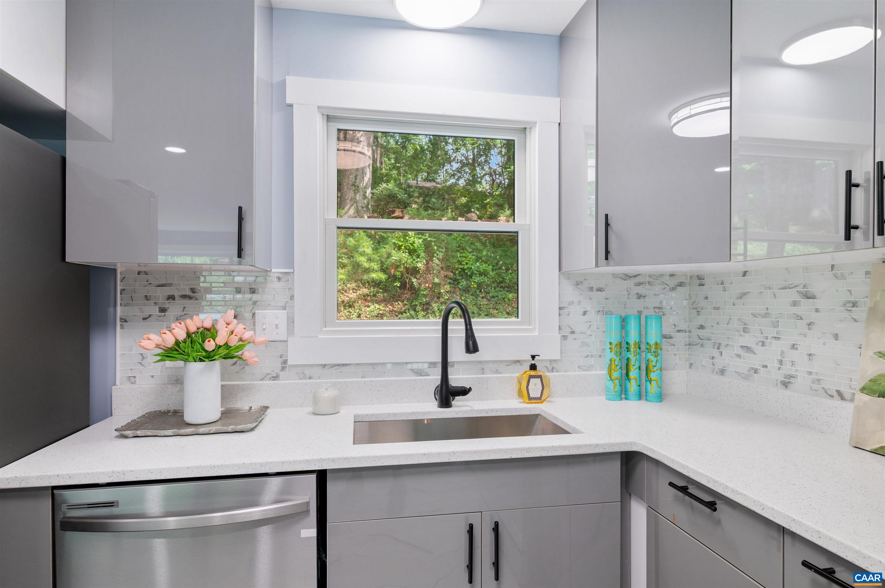 2232 Brandywine Drive Charlottesville, VA 22901 - Photo 16 of 53 a kitchen with a sink and window