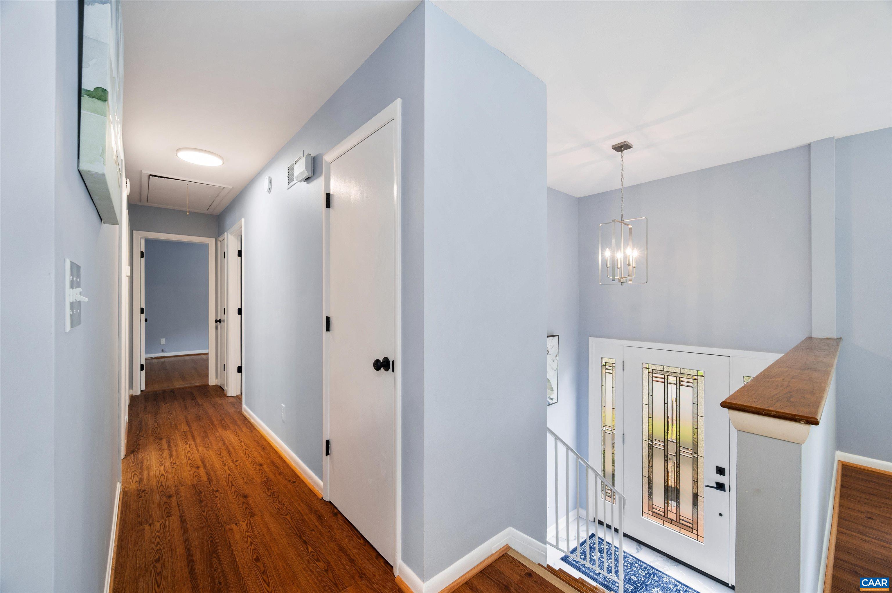 2232 Brandywine Drive Charlottesville, VA 22901 - Photo 18 of 53 a view of hallway with stairs and wooden floor