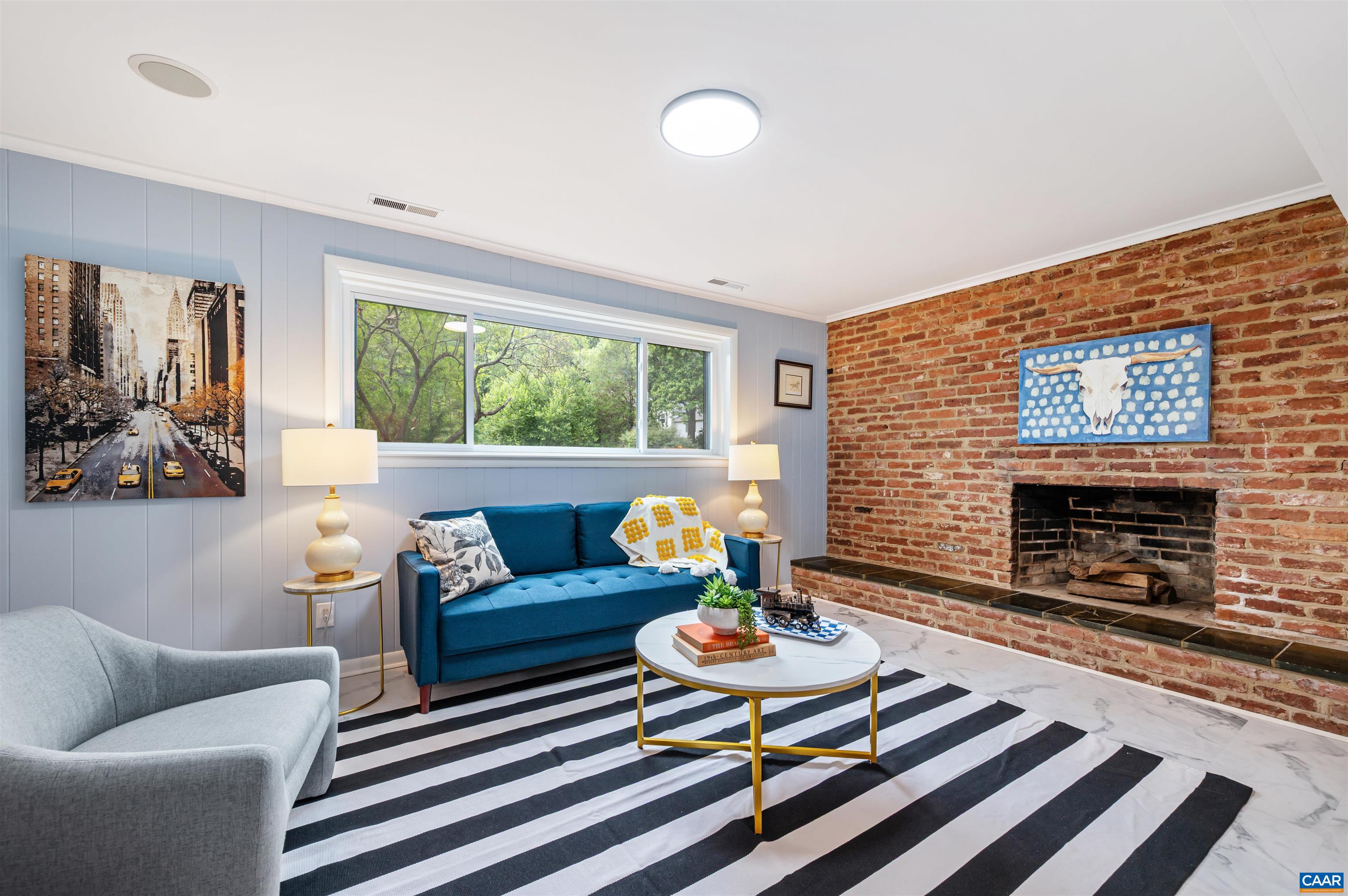 2232 Brandywine Drive Charlottesville, VA 22901 - Photo 31 of 53 a living room with furniture and a fireplace