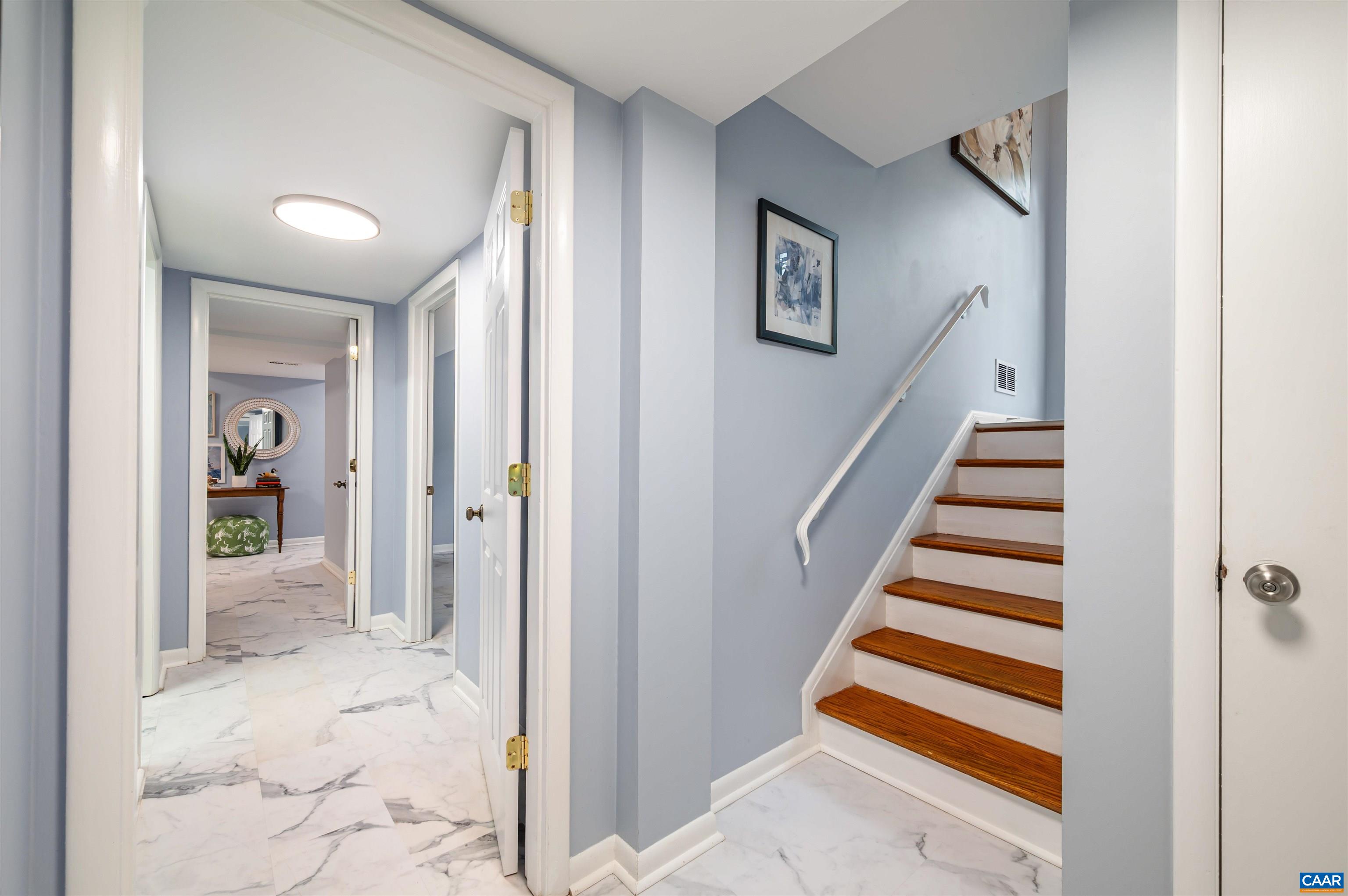 2232 Brandywine Drive Charlottesville, VA 22901 - Photo 33 of 53 a view of a hallway with wooden floor and entryway