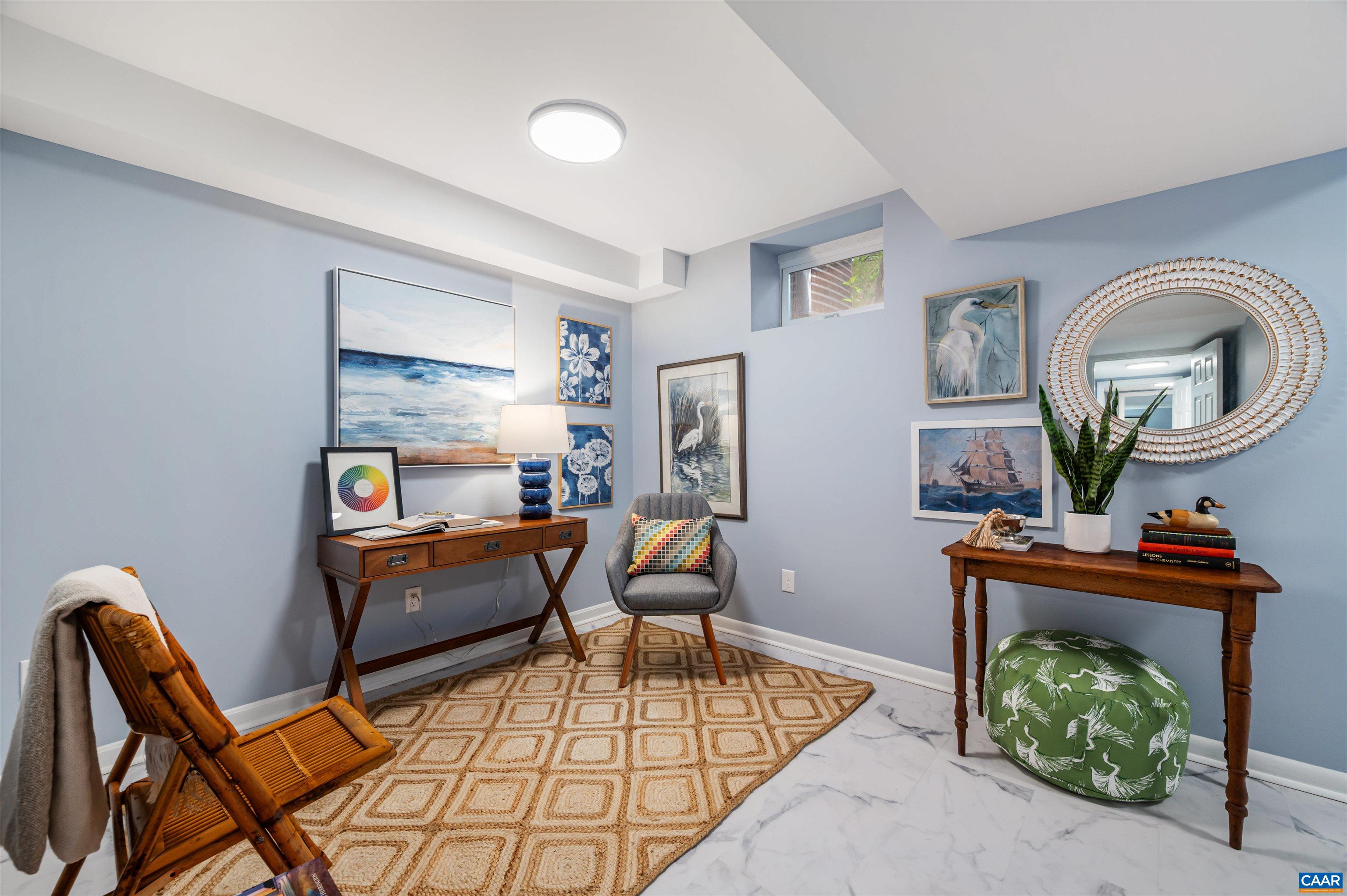 2232 Brandywine Drive Charlottesville, VA 22901 - Photo 34 of 53 a living room with furniture and a fireplace