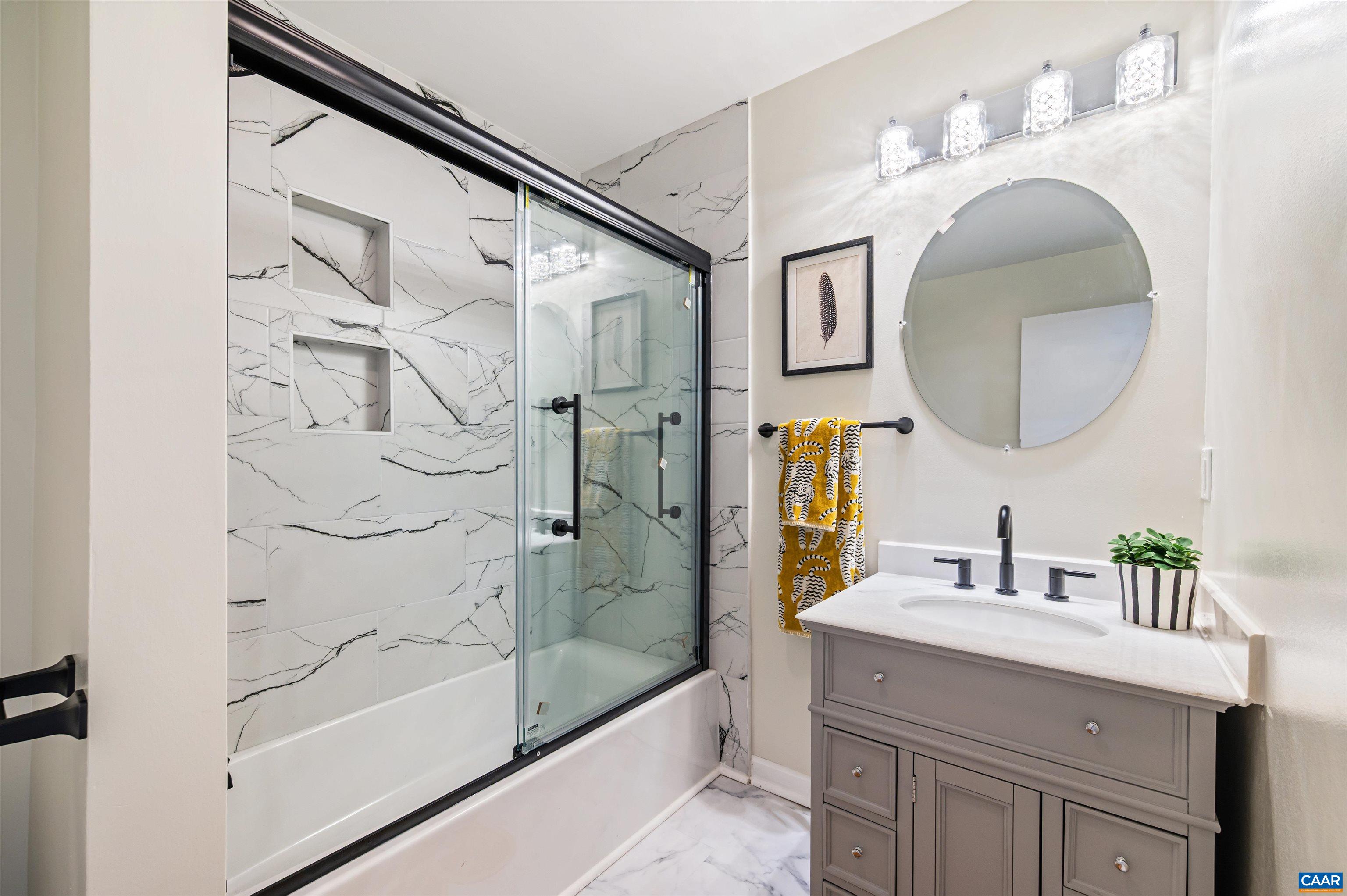 2232 Brandywine Drive Charlottesville, VA 22901 - Photo 37 of 53 a bathroom with a sink and a mirror