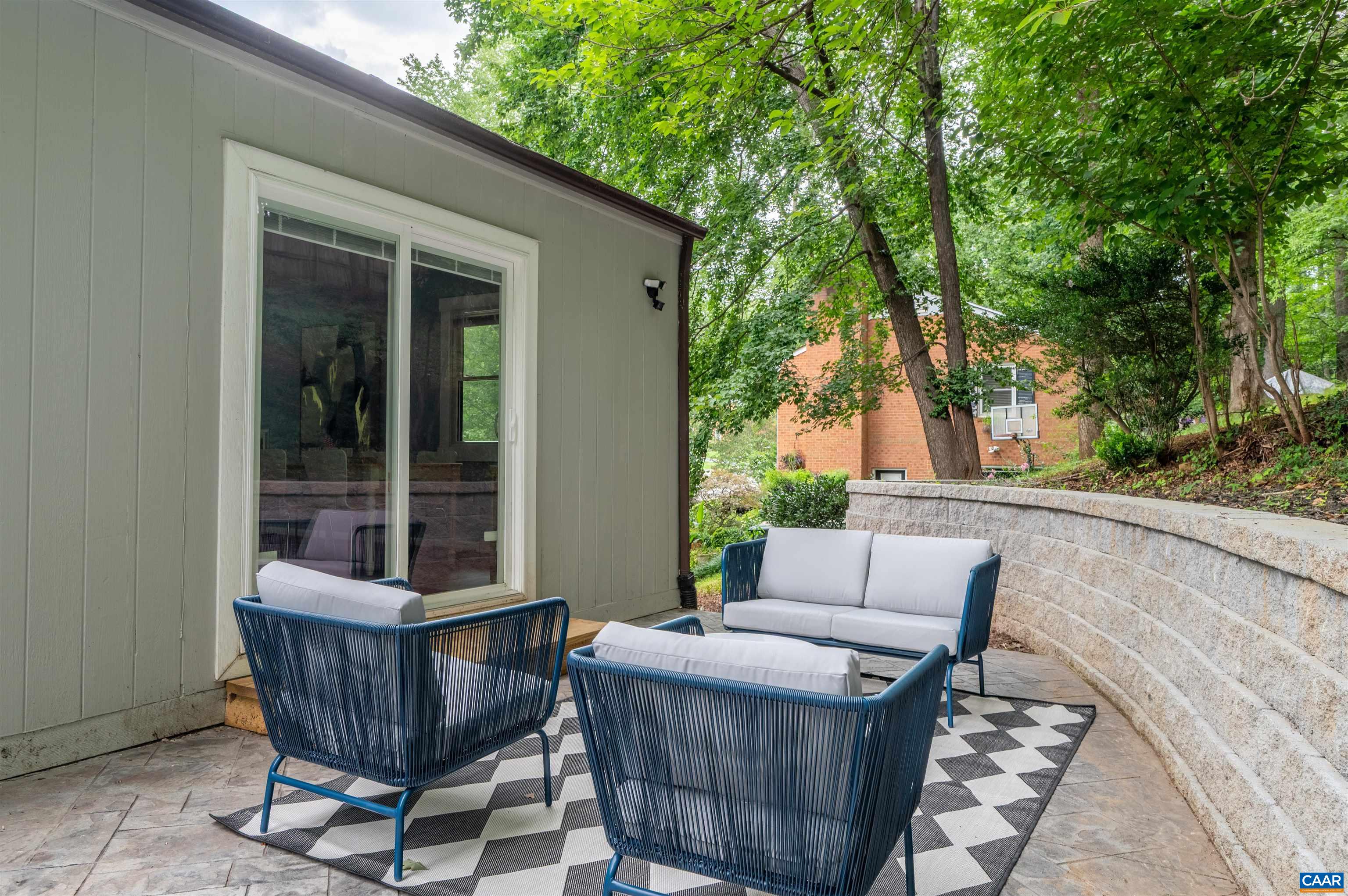 2232 Brandywine Drive Charlottesville, VA 22901 - Photo 40 of 53 a view of patio with a table and chairs