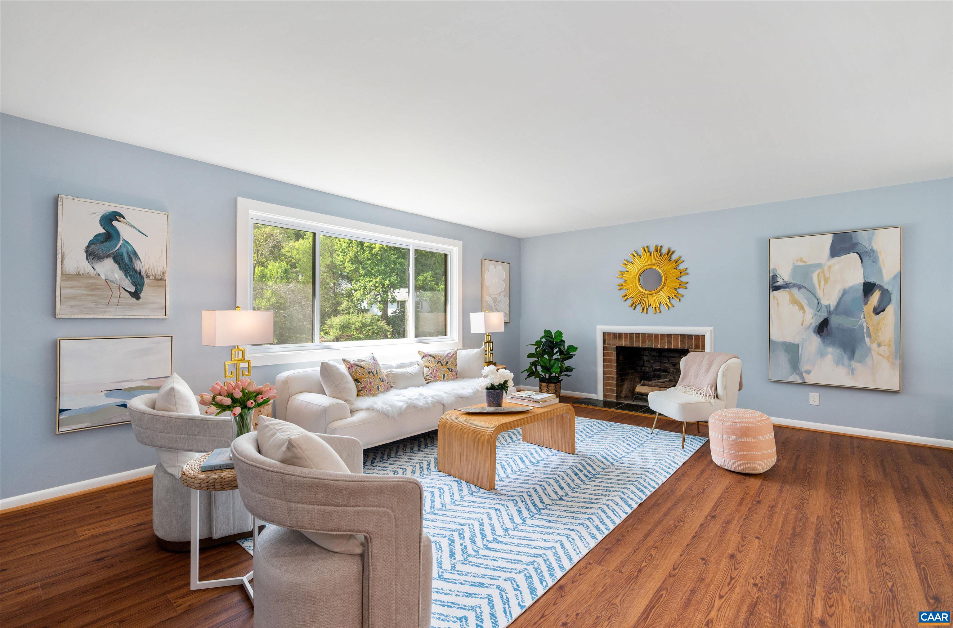 2232 Brandywine Drive Charlottesville, VA 22901 - Photo 4 of 53 a living room with furniture and a fireplace