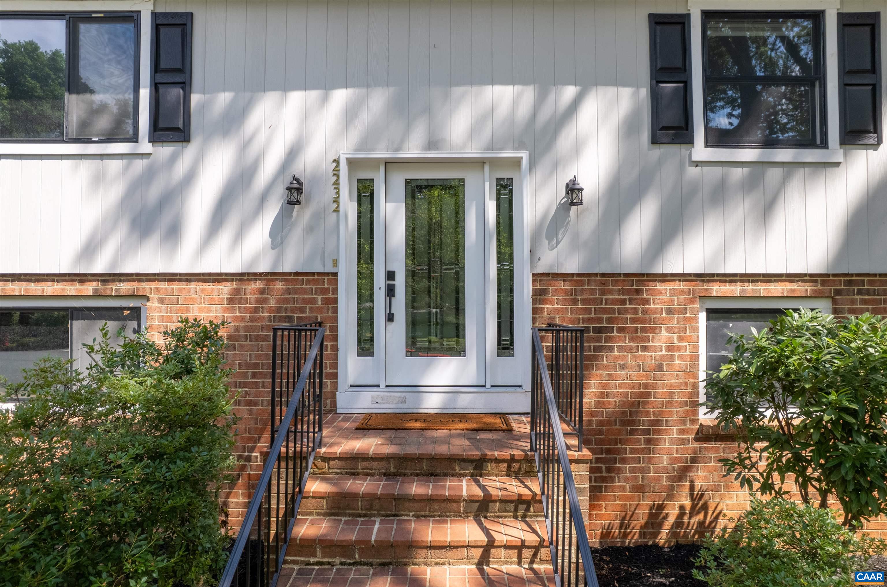 2232 Brandywine Drive Charlottesville, VA 22901 - Photo 45 of 53 a front view of a house with a glass windows