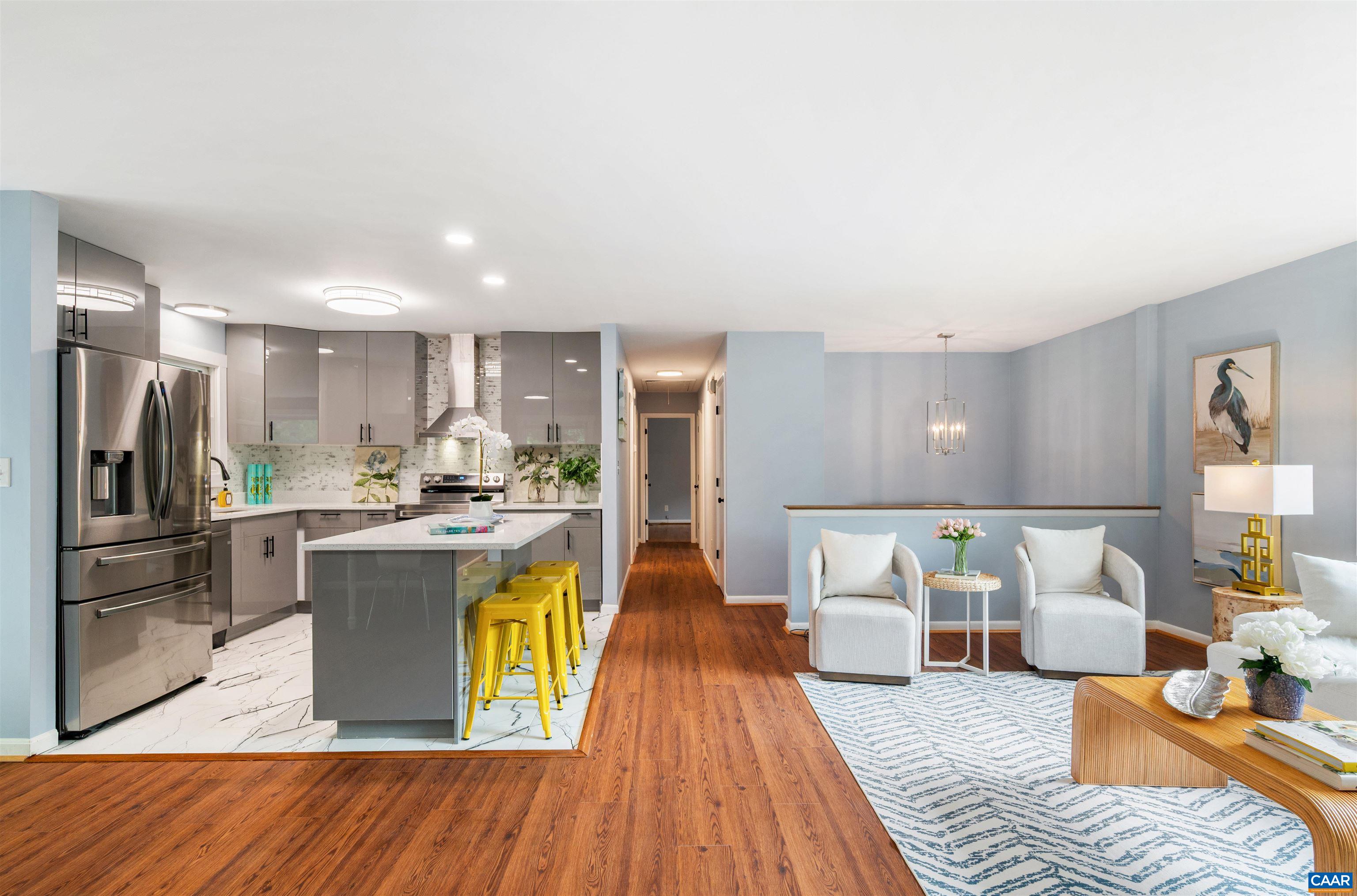 2232 Brandywine Drive Charlottesville, VA 22901 - Photo 7 of 53 a living room with stainless steel appliances furniture and a wooden floor
