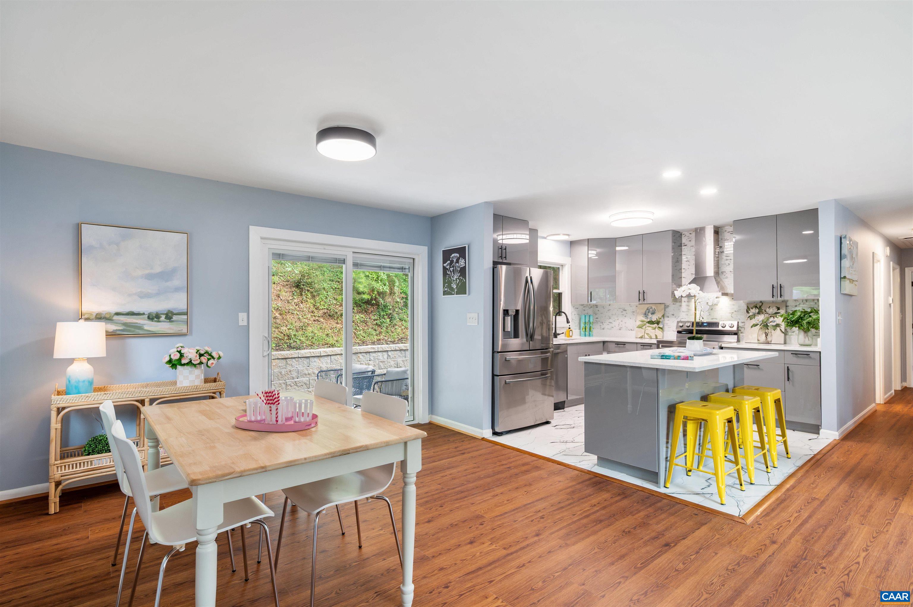 2232 Brandywine Drive Charlottesville, VA 22901 - Photo 8 of 53 a kitchen with a table and chairs in it
