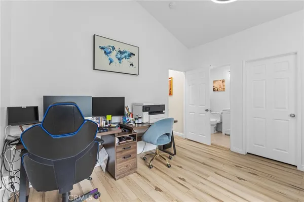 a workspace with wooden floor and a workspace