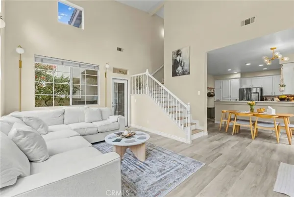 a living room with furniture and a table