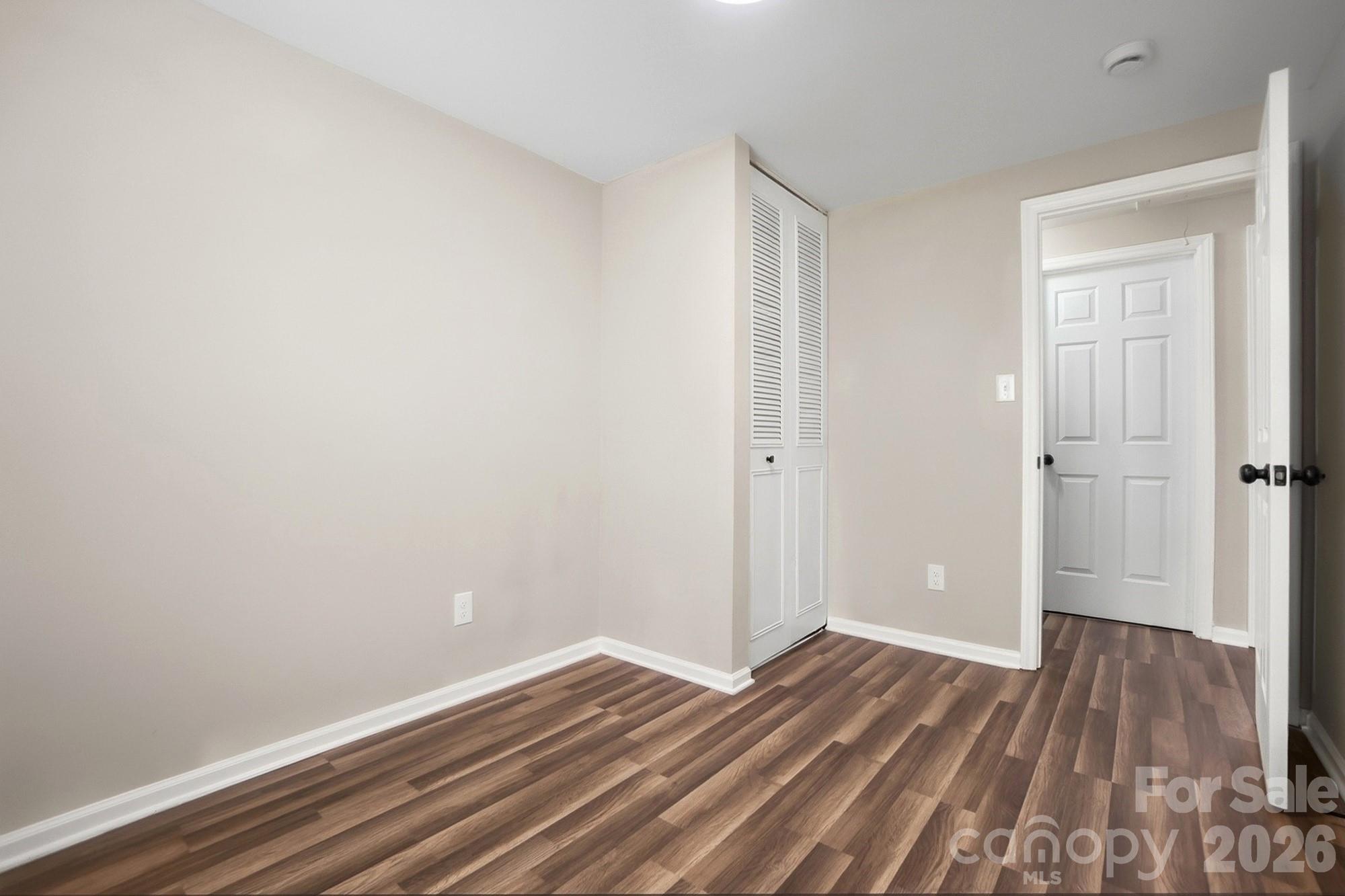 6621 Piney Path Road Charlotte, NC 28212 - Photo 20 of 36 a view of a room with wooden floor