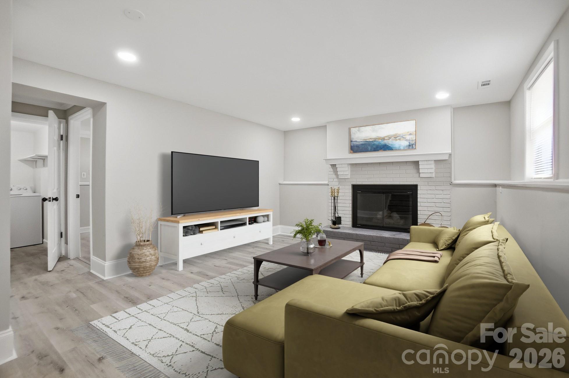 6621 Piney Path Road Charlotte, NC 28212 - Photo 21 of 36 a living room with furniture and a flat screen tv