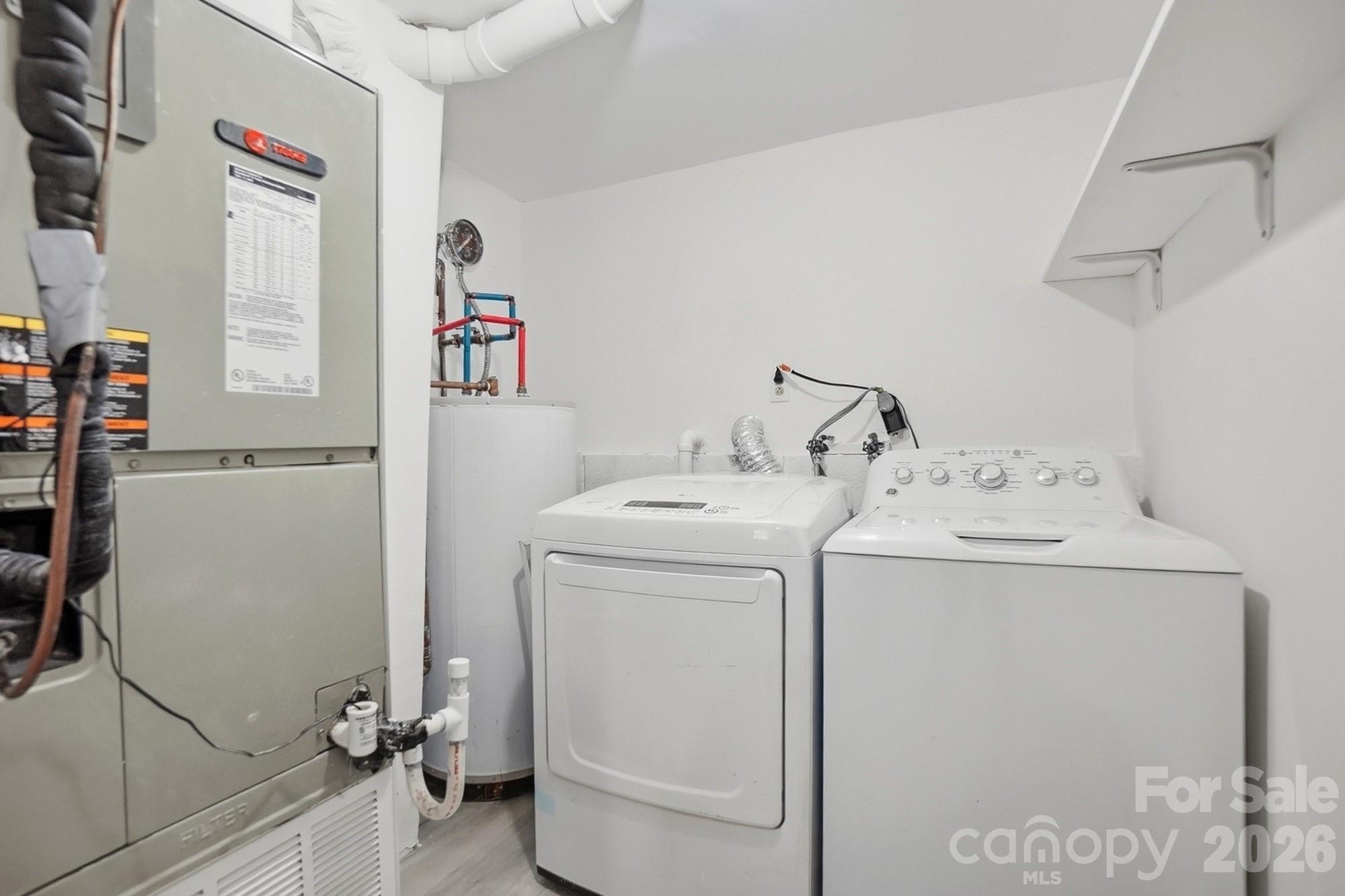 6621 Piney Path Road Charlotte, NC 28212 - Photo 25 of 36 a utility room with dryer and washer