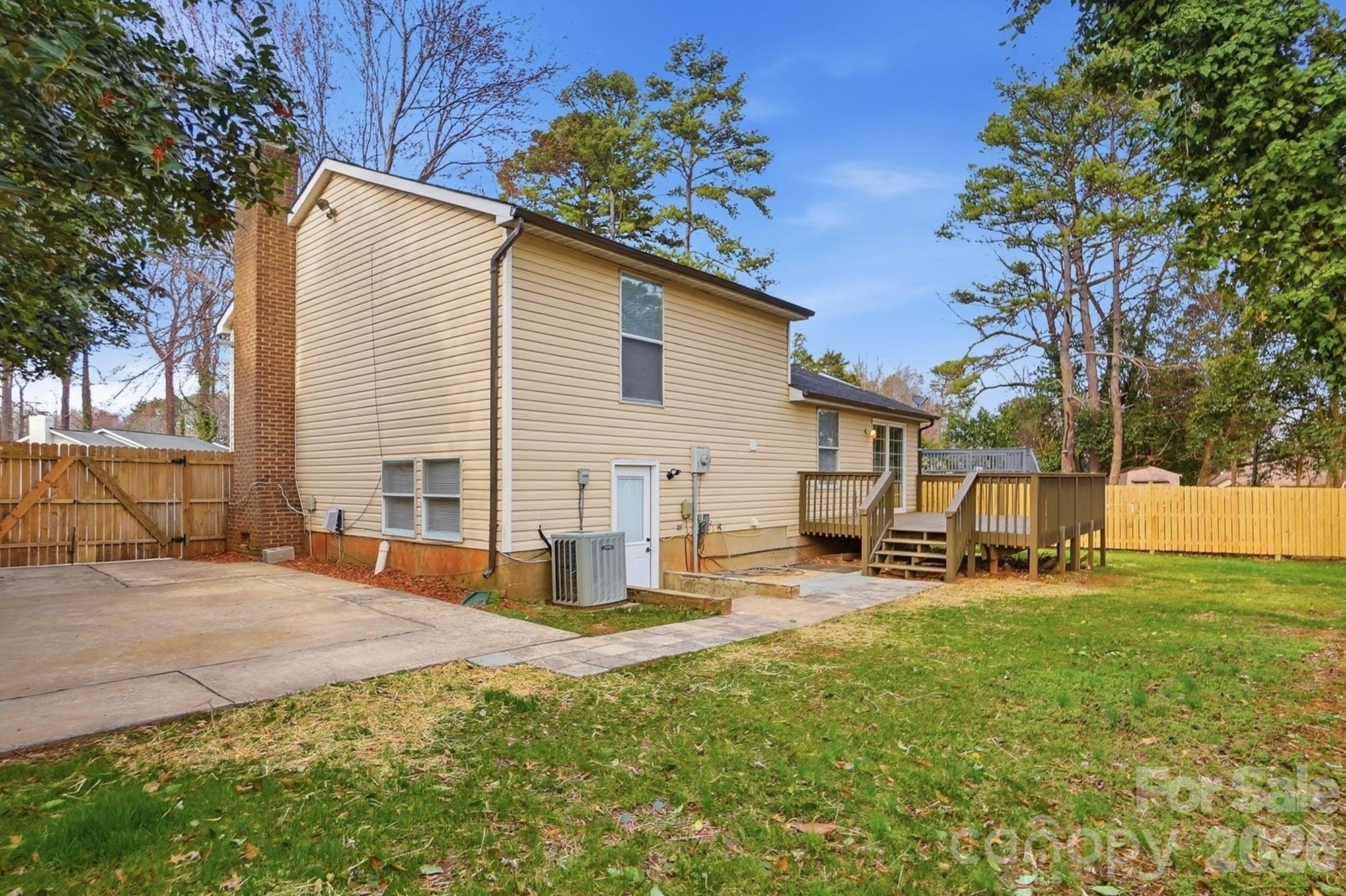 6621 Piney Path Road Charlotte, NC 28212 - Photo 30 of 36 a view of a house with backyard porch and sitting area
