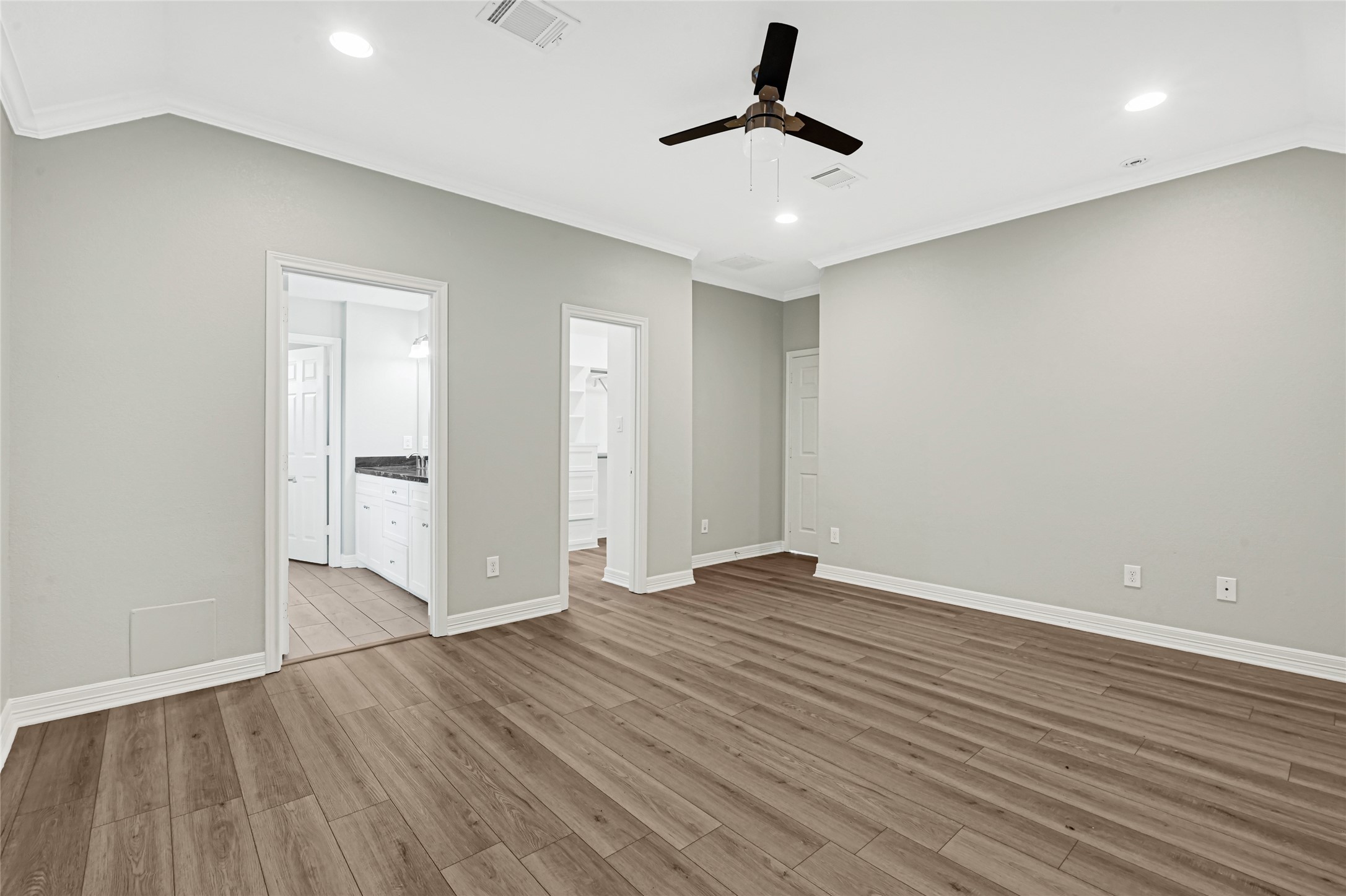 9823 Bamboo Road, Unit B Houston, TX 77041 - Photo 25 of 33 Bright bedroom with large windows and a comfortable layout.