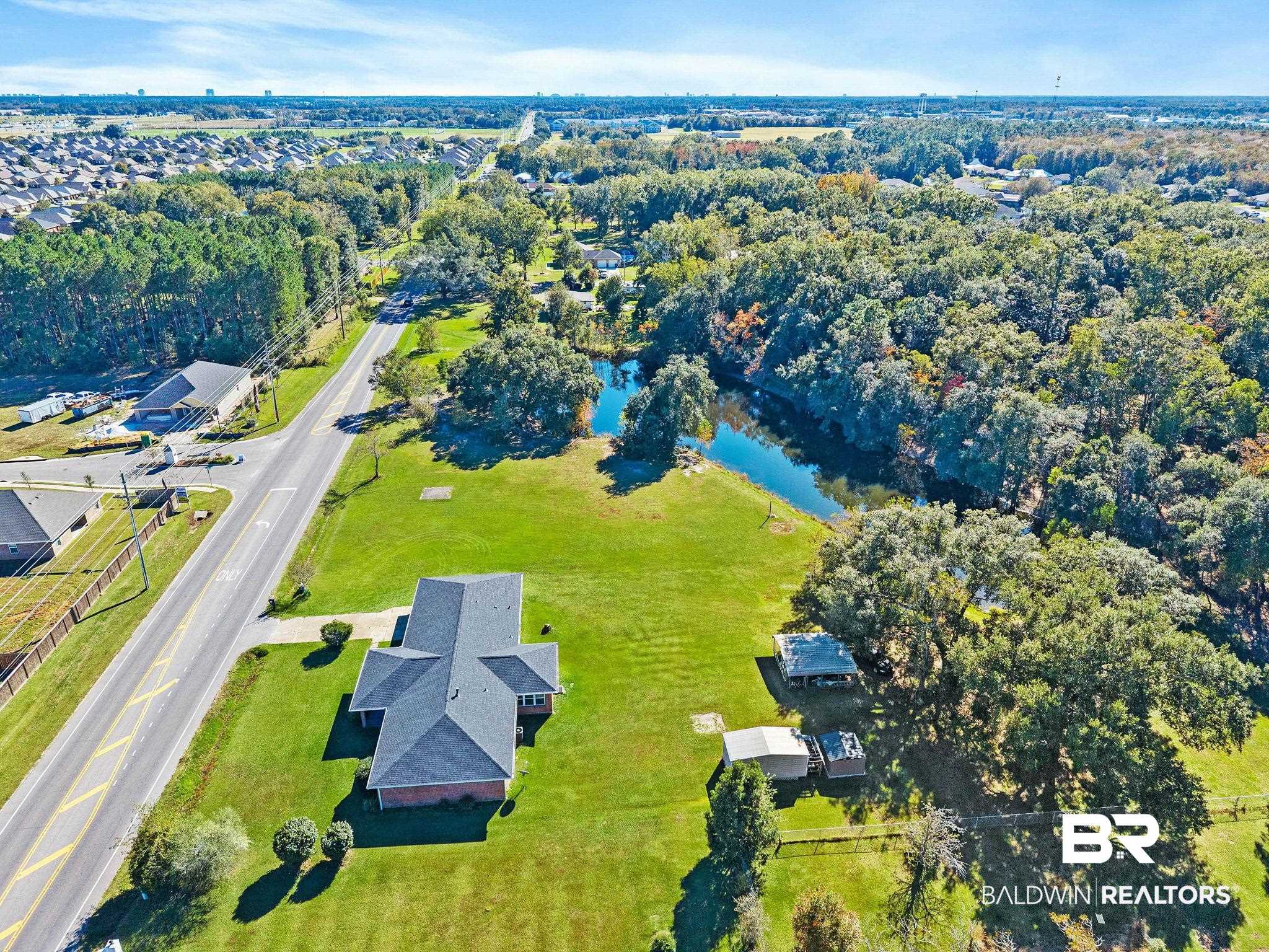 1510 South Juniper Street Foley, AL 36535 - Photo 32 of 36 Aerial view of a large body of water