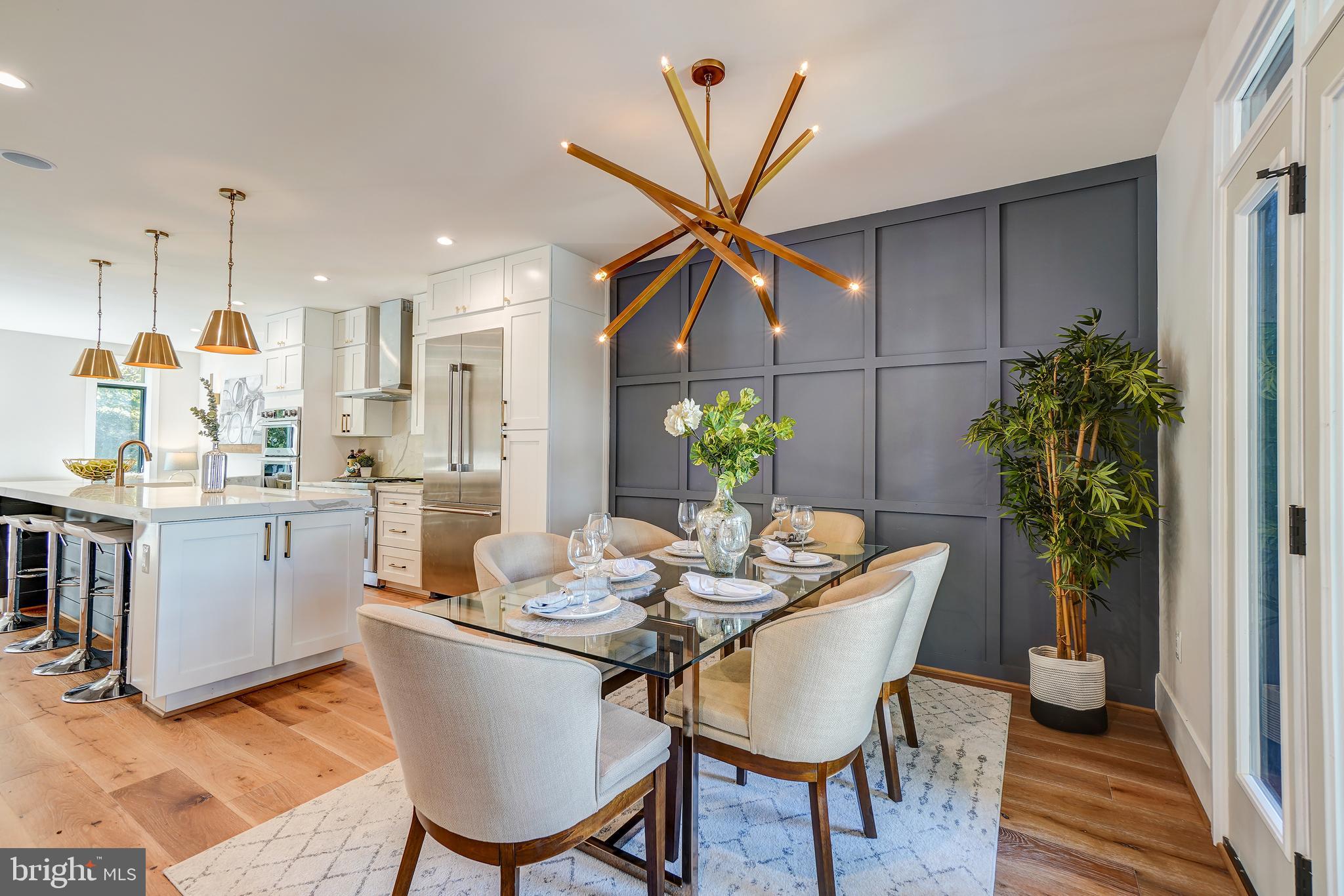 3615 S Street Northwest Washington, DC 20007 - Photo 12 of 48 Dining room w/ paneled wall opens to rear deck