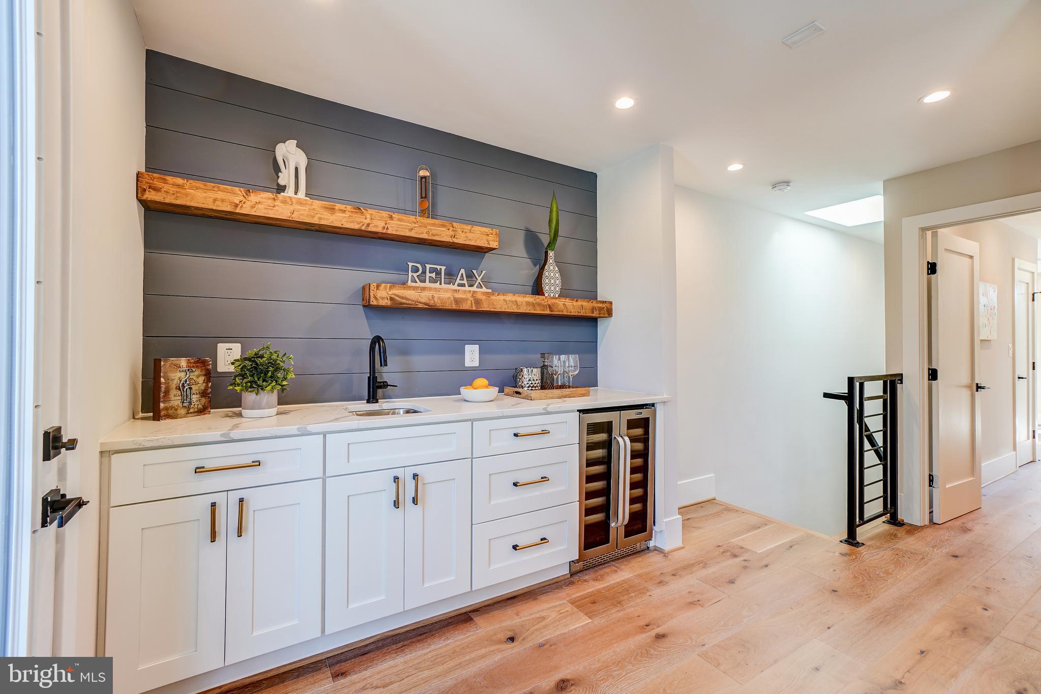 3615 S Street Northwest Washington, DC 20007 - Photo 33 of 48 Wet bar w/wine refrigerator & quartz counters