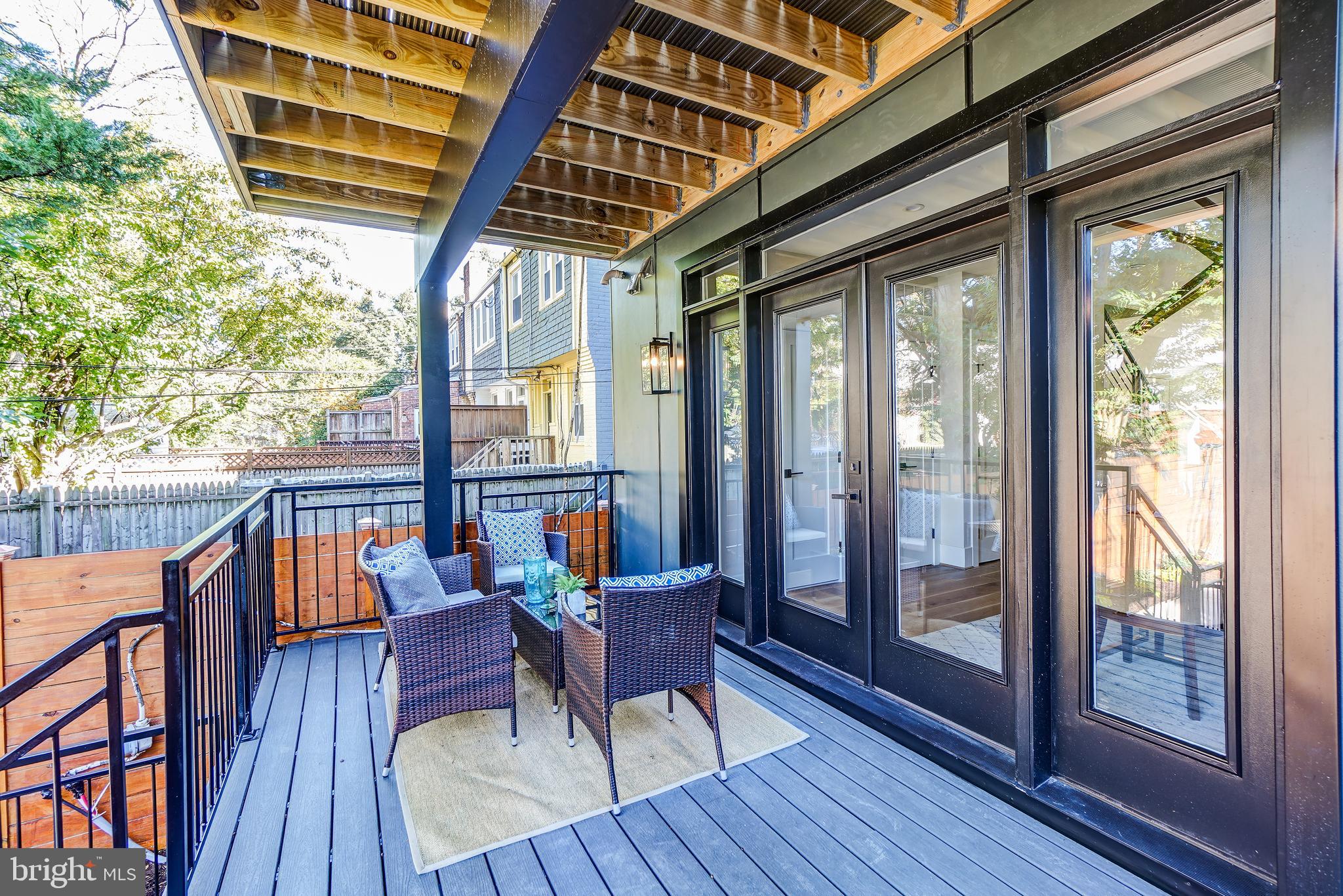 3615 S Street Northwest Washington, DC 20007 - Photo 46 of 48 Dining room leads to spacious rear deck